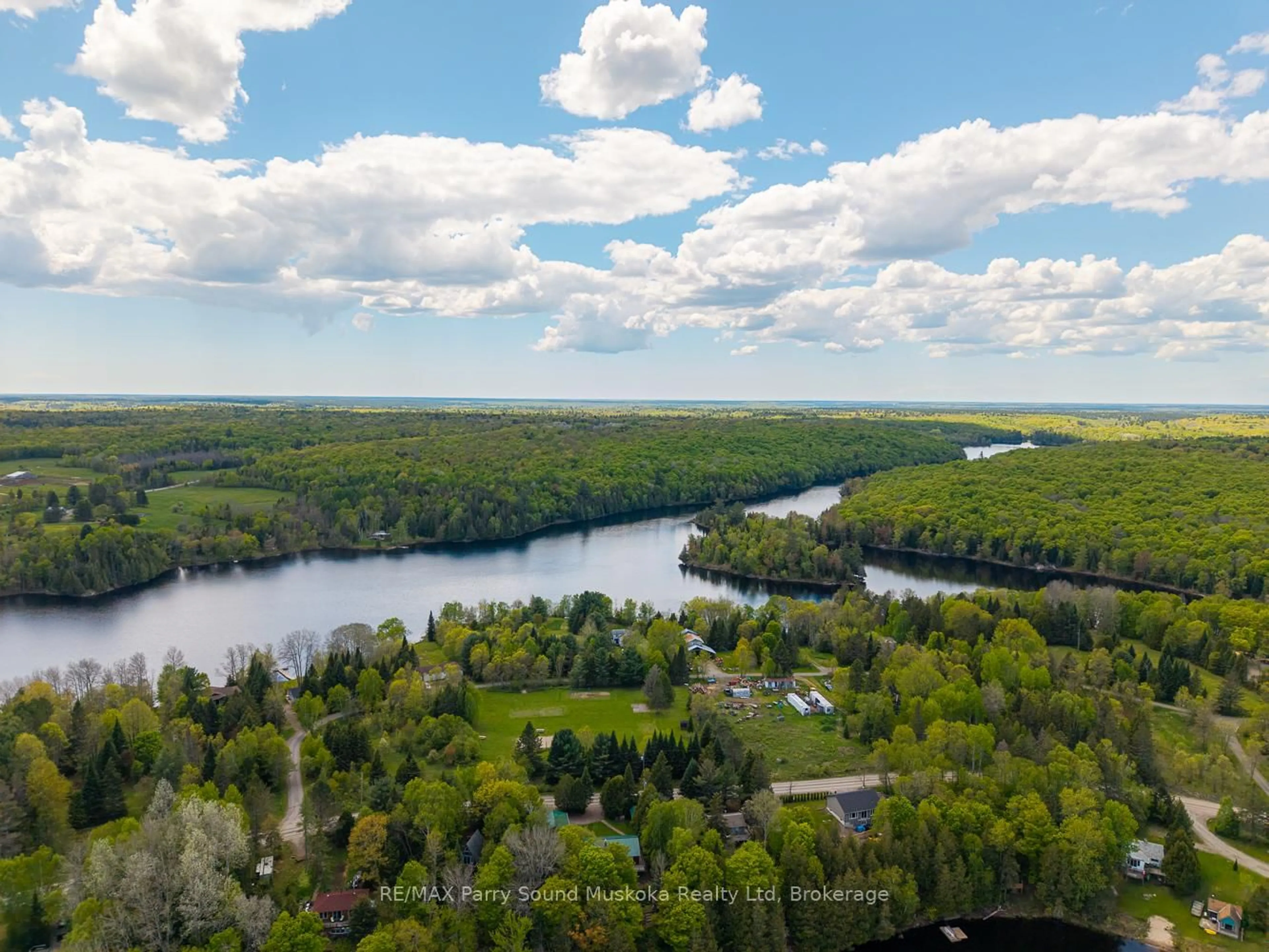 A pic from outside/outdoor area/front of a property/back of a property/a pic from drone, water/lake/river/ocean view for 57 Shady Maple Tr, Whitestone Ontario P0A 1G0