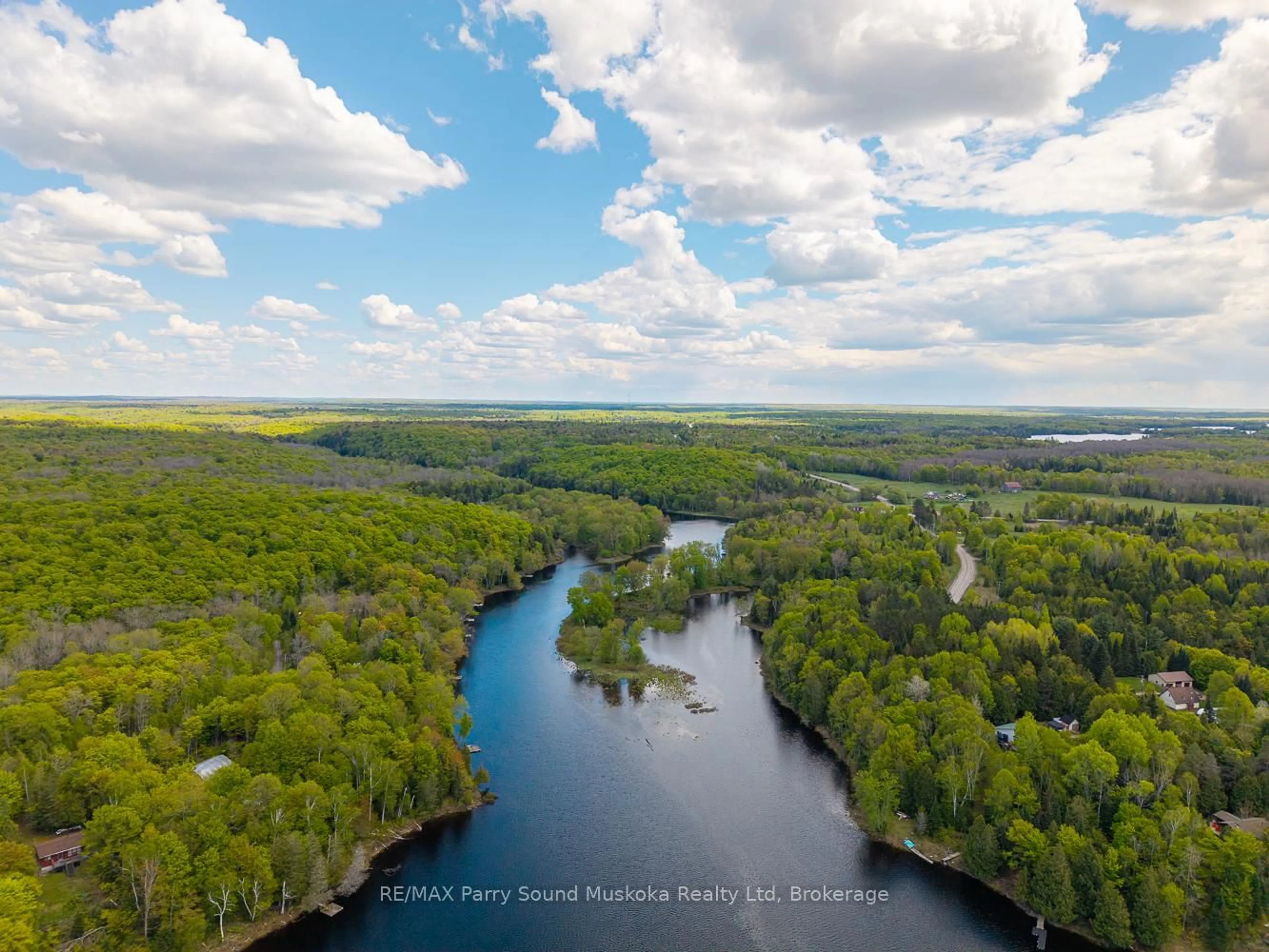 A pic from outside/outdoor area/front of a property/back of a property/a pic from drone, water/lake/river/ocean view for 57 Shady Maple Tr, Whitestone Ontario P0A 1G0