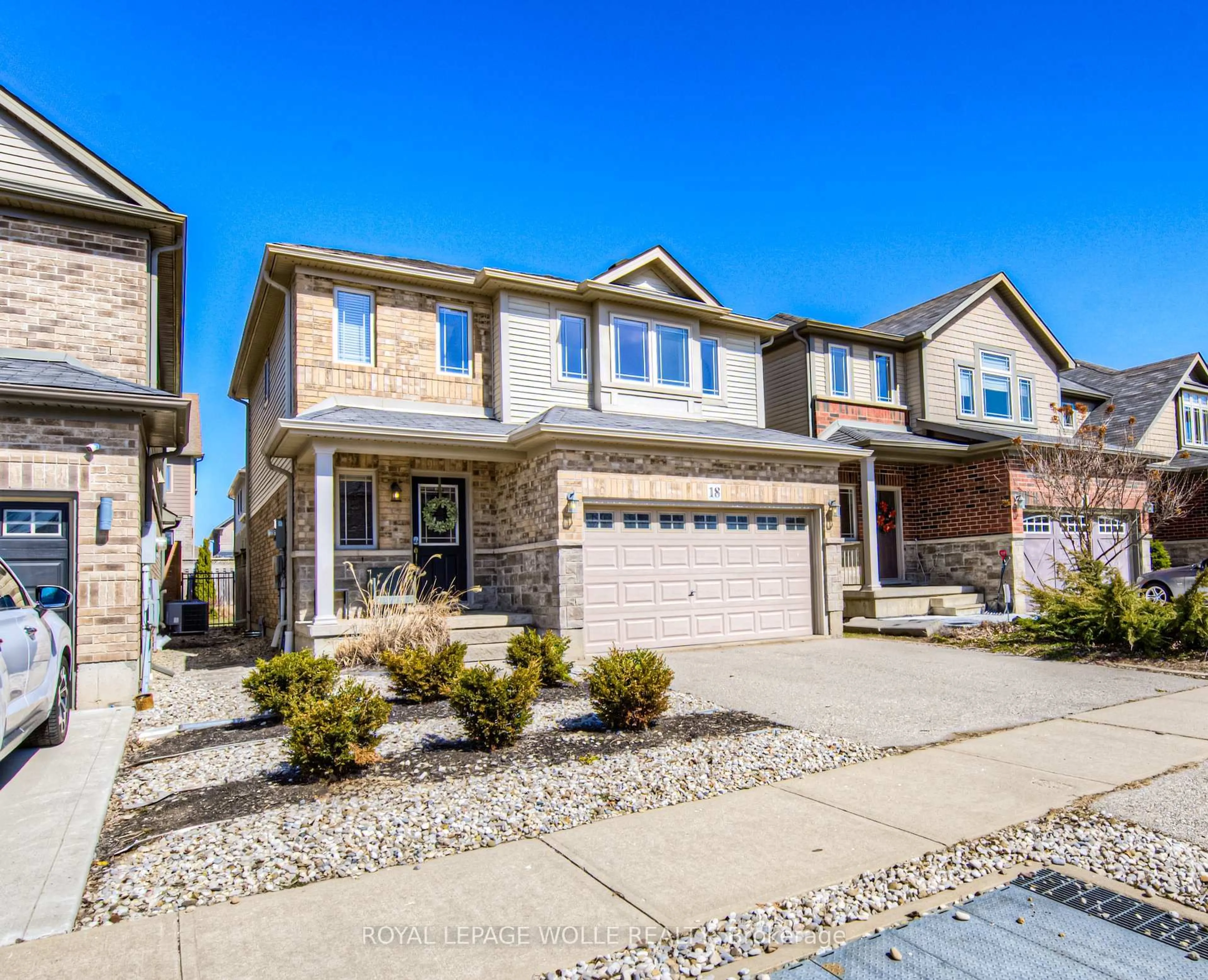 Home with brick exterior material, street for 18 Creek Ridge St, Kitchener Ontario N2R 0B5