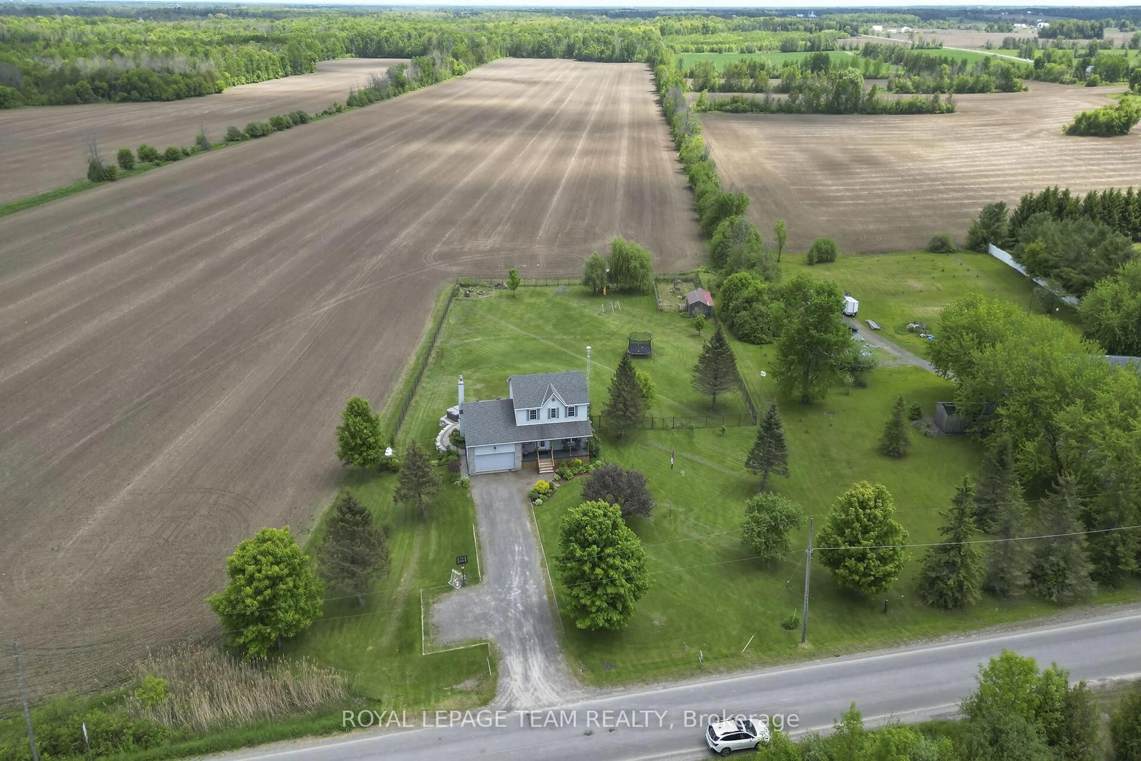 A pic from outside/outdoor area/front of a property/back of a property/a pic from drone, street for 590 Latourell Rd, North Grenville Ontario K0E 1S0