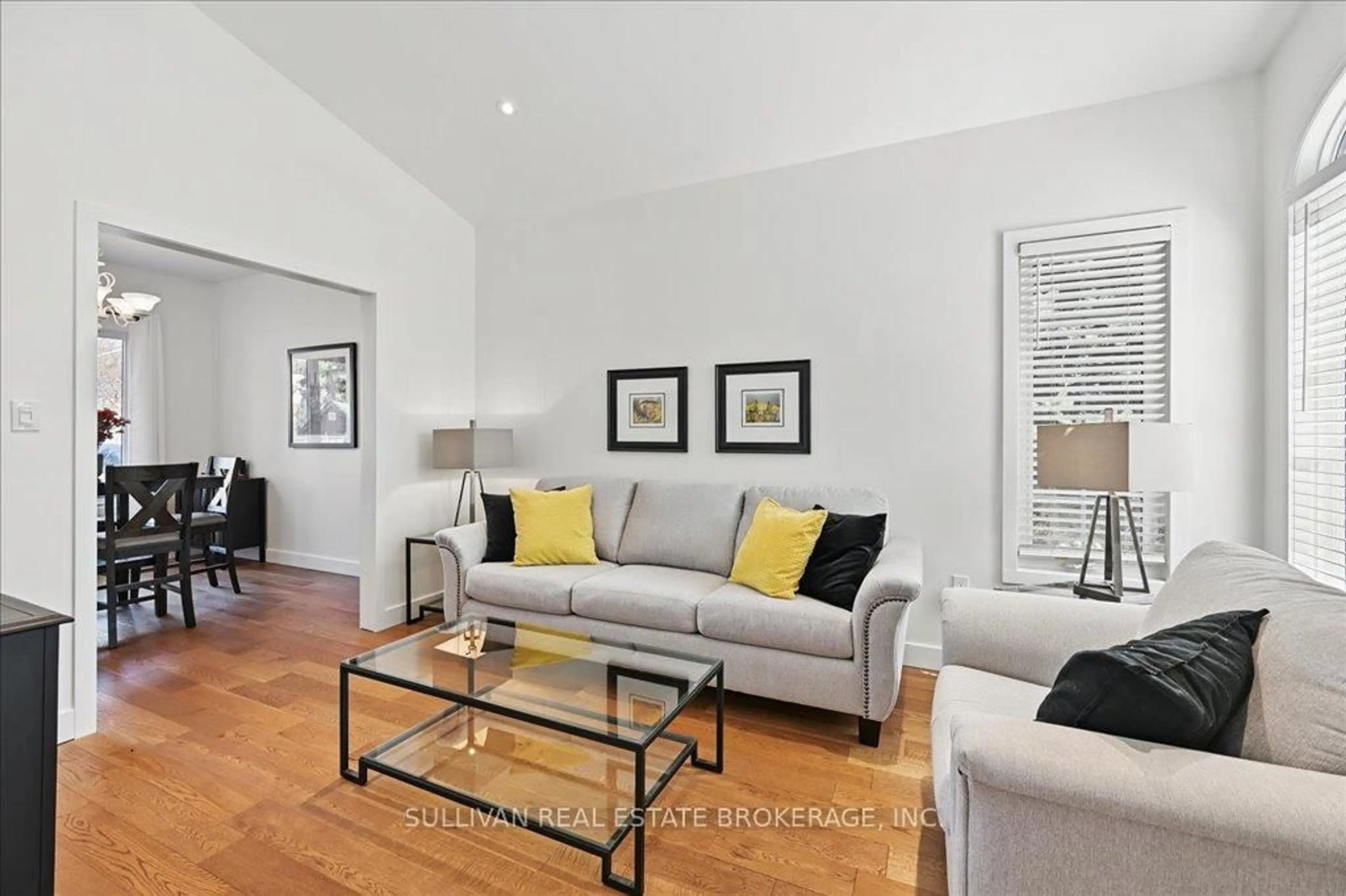 Living room with furniture, wood/laminate floor for 17 Rockhaven Lane, Hamilton Ontario L8B 0H7