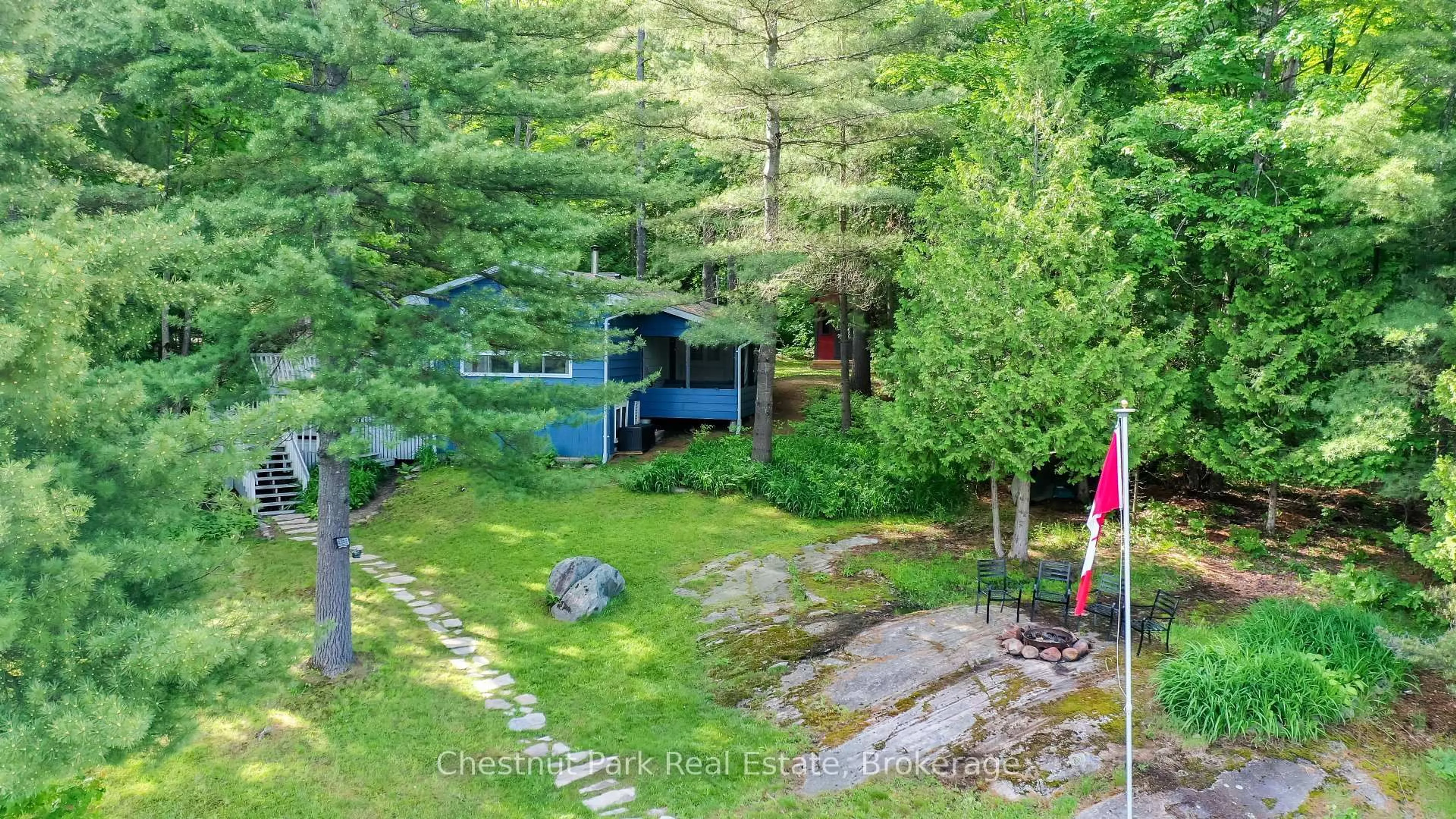 A pic from outside/outdoor area/front of a property/back of a property/a pic from drone, forest/trees view for 1053 Bruce Lake Dr #5, Muskoka Lakes Ontario P0B 1G0