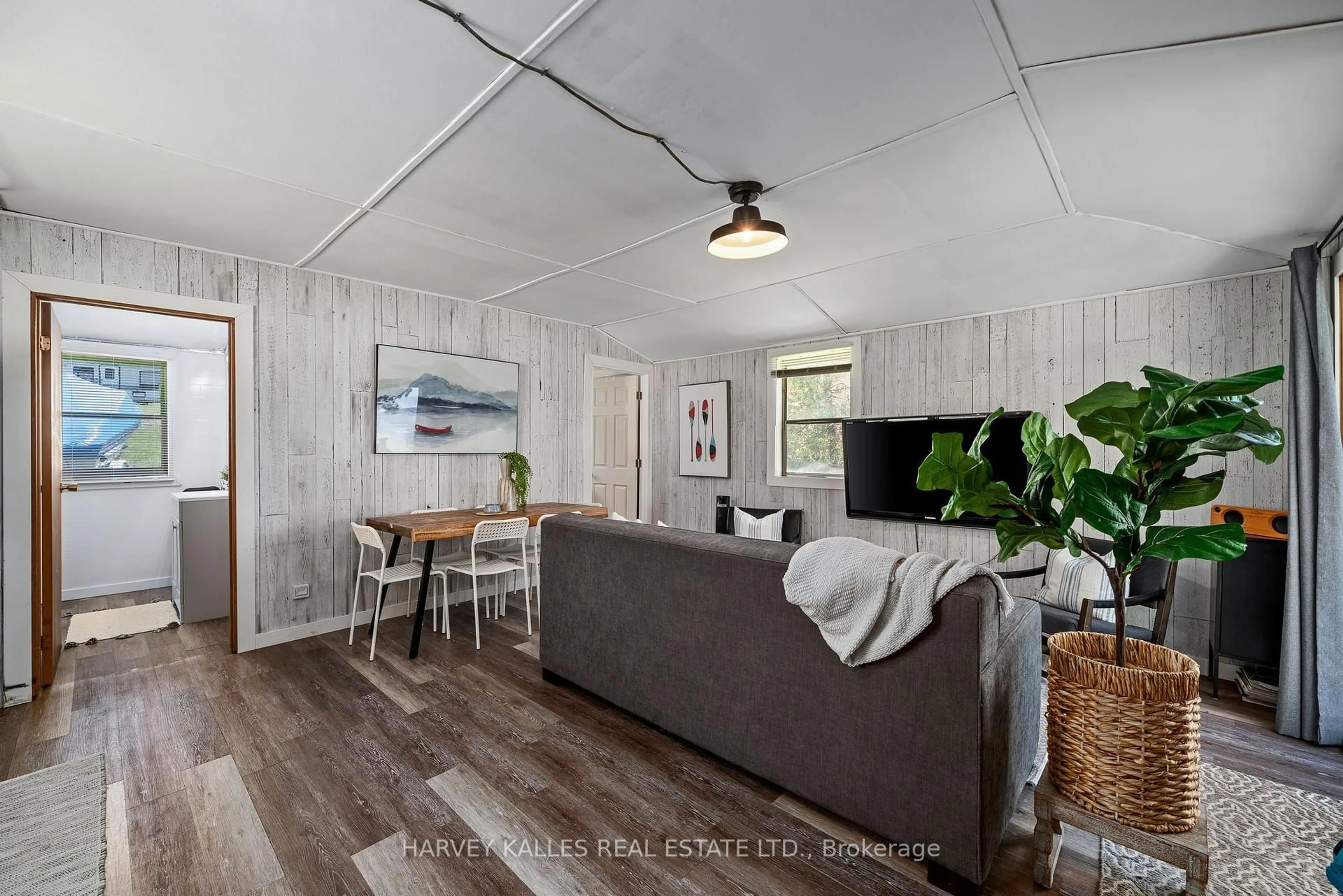 Living room with furniture, wood/laminate floor for 101 Treasure Cove Lane, Prince Edward County Ontario K0K 2T0
