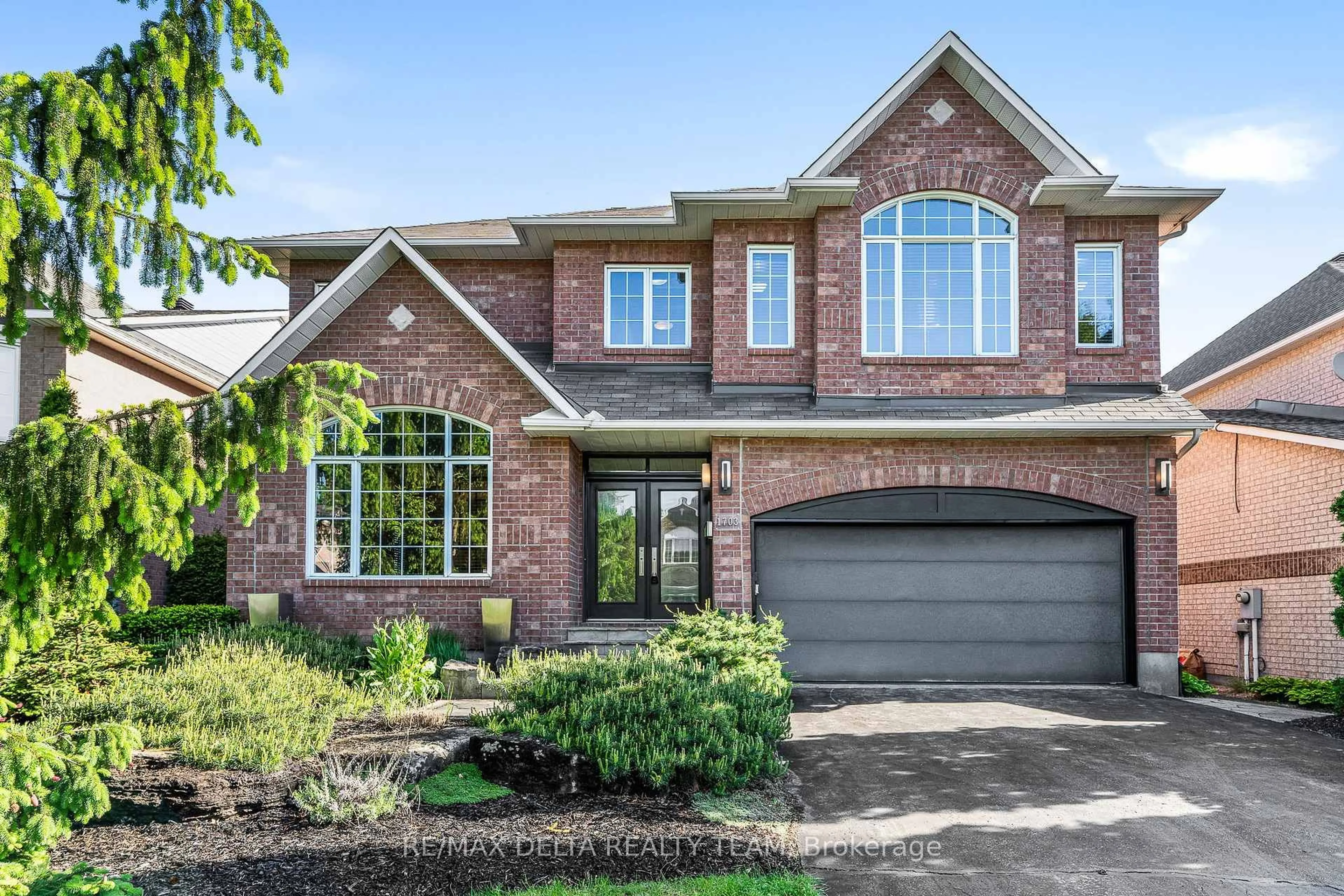 Home with brick exterior material, street for 1703 Des Sapins Gdns, Ottawa Ontario K1C 8E3