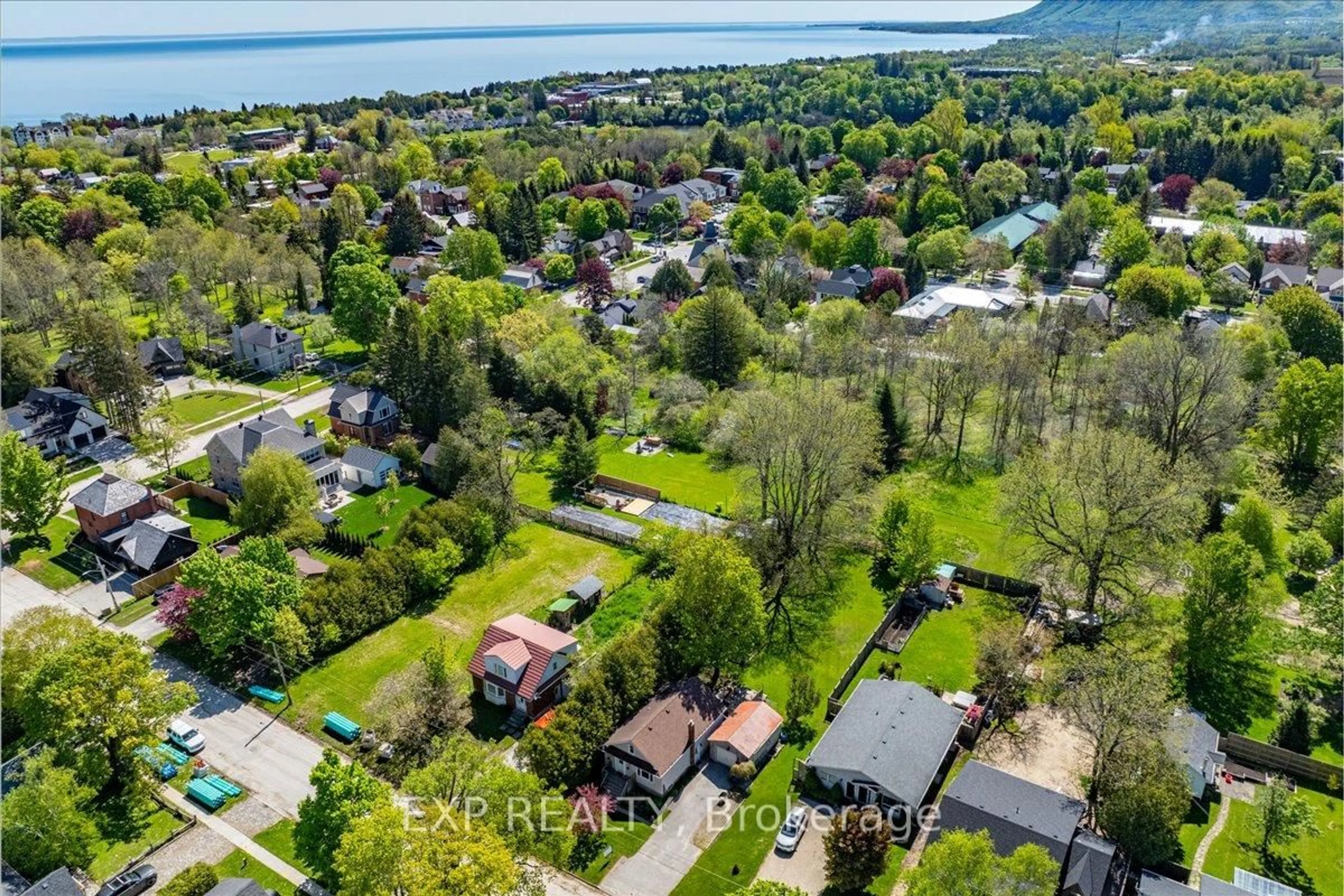 A pic from outside/outdoor area/front of a property/back of a property/a pic from drone, water/lake/river/ocean view for 79 Elma St, Blue Mountains Ontario N0H 2P0