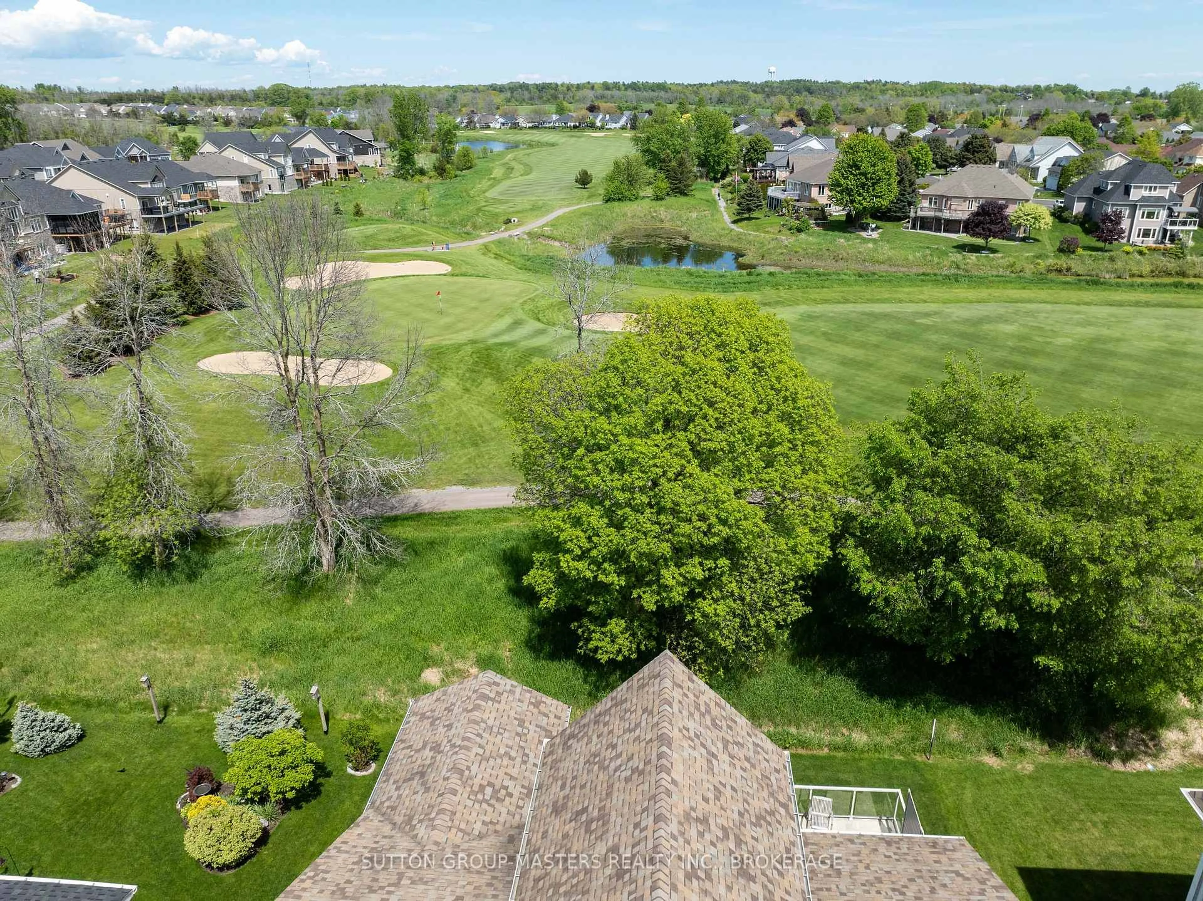 A pic from outside/outdoor area/front of a property/back of a property/a pic from drone, unknown for 125 Country Club Dr, Bath Ontario K0H 1G0