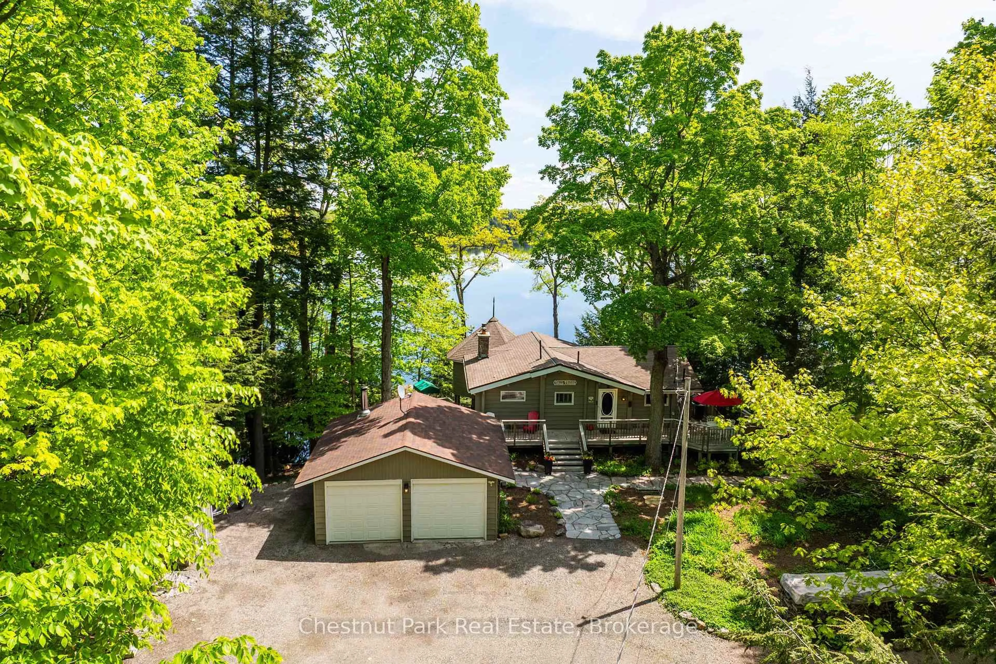 A pic from outside/outdoor area/front of a property/back of a property/a pic from drone, water/lake/river/ocean view for 1246 Dudley Rd #3, Muskoka Lakes Ontario P0C 1A0