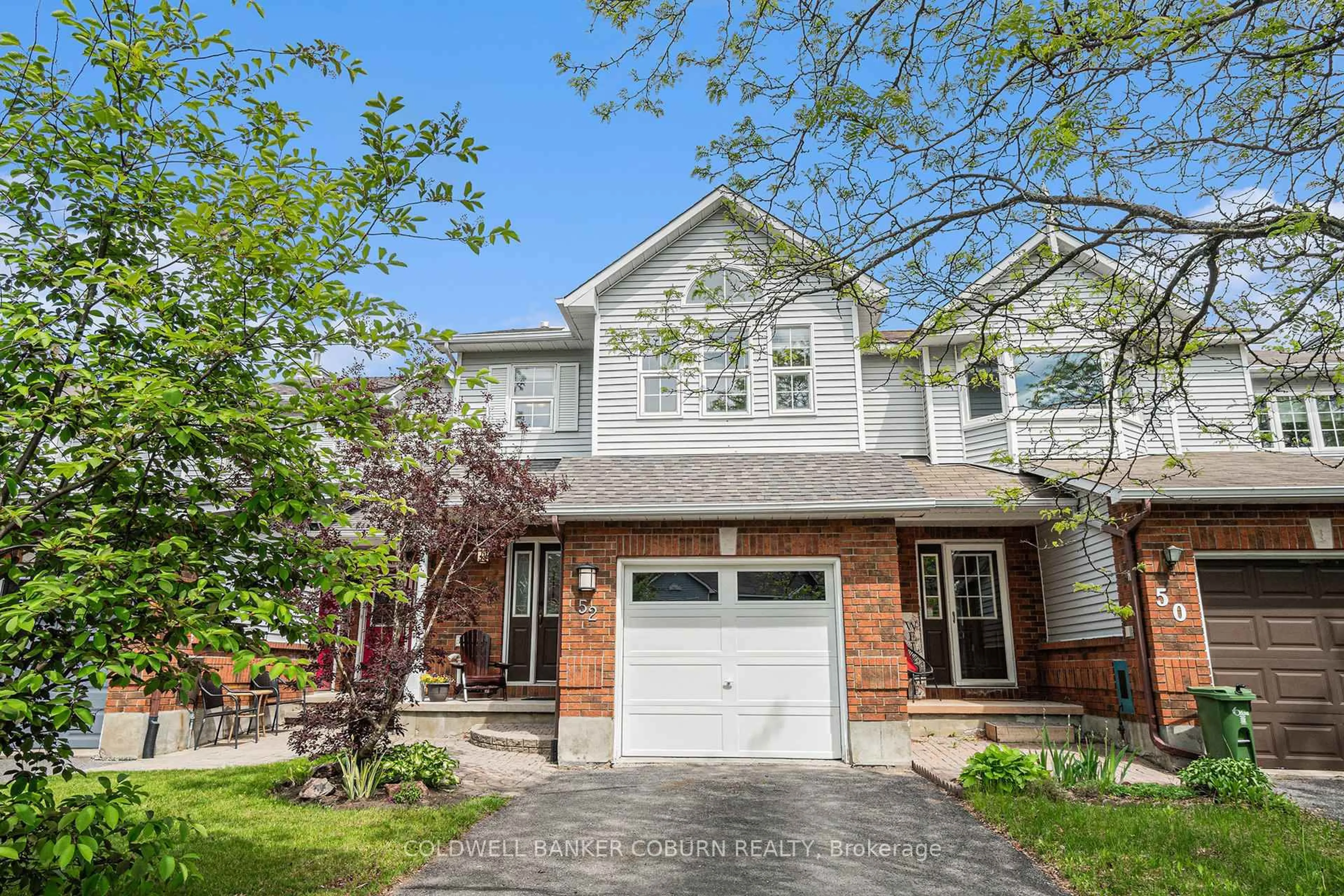 Home with brick exterior material, street for 52 Blackdome Cres, Ottawa Ontario K2T 1A9