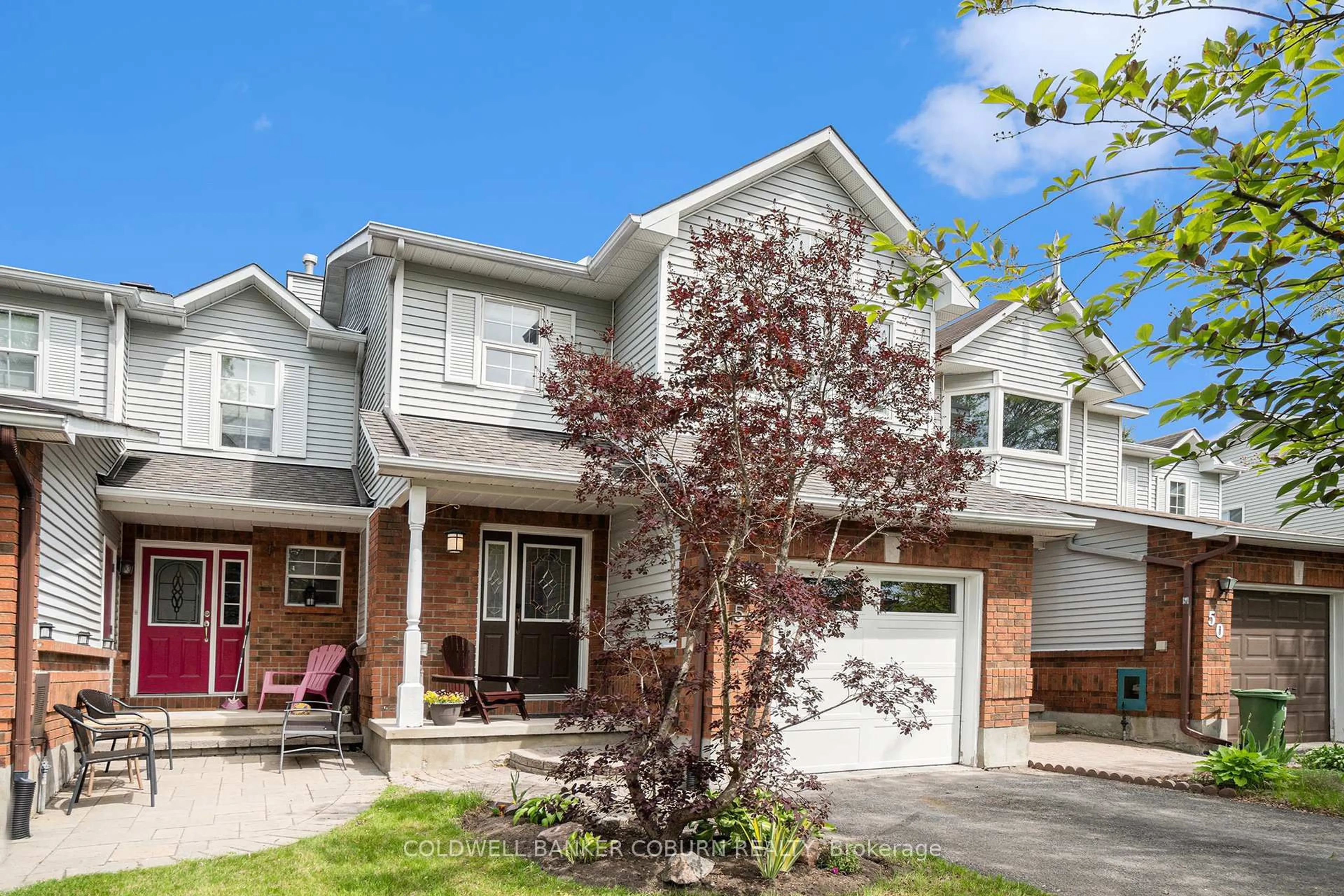 Home with brick exterior material, street for 52 Blackdome Cres, Ottawa Ontario K2T 1A9