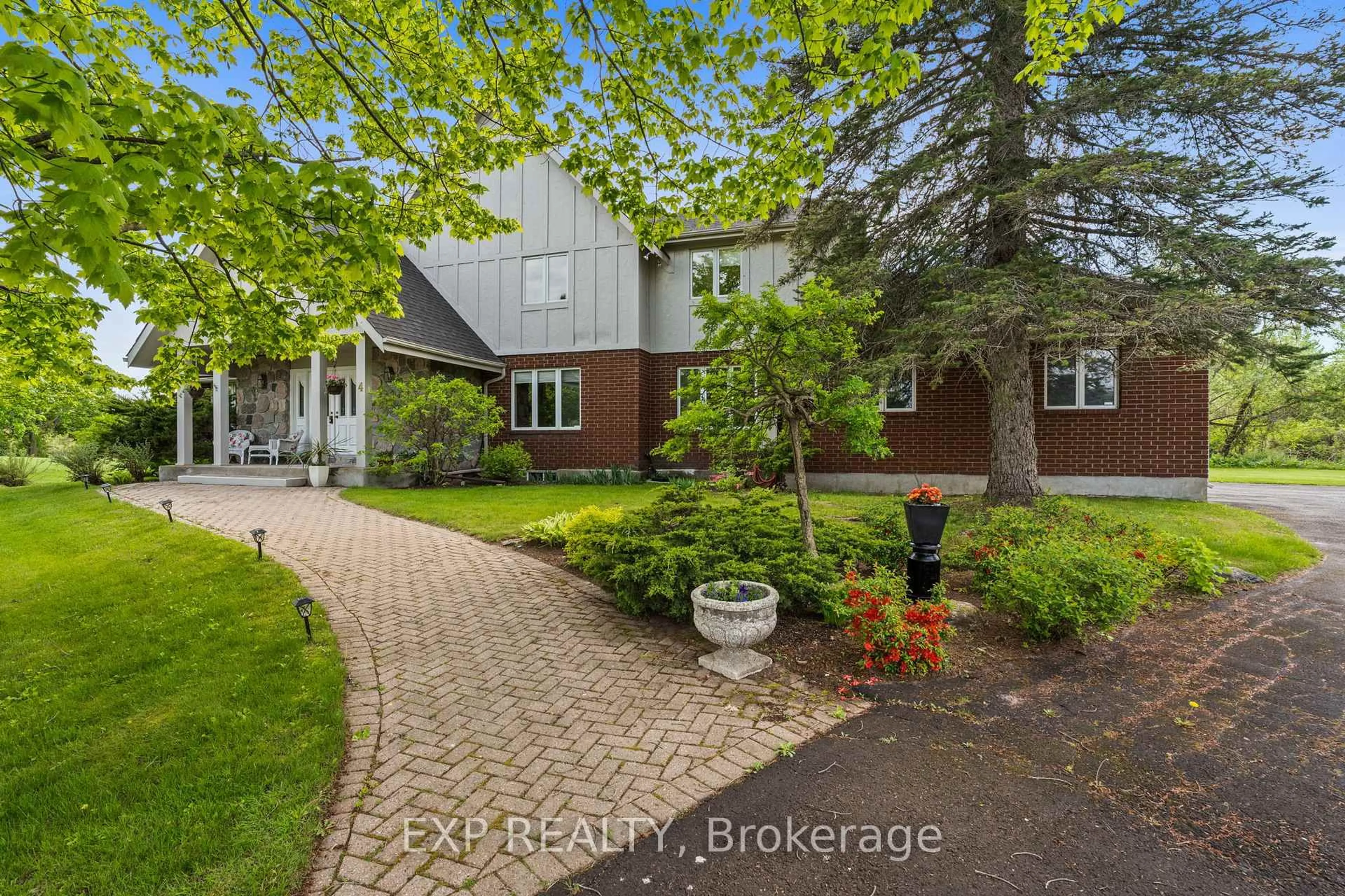 Home with brick exterior material, street for 4 Barry Burn Crt, Ottawa Ontario K2R 1C5