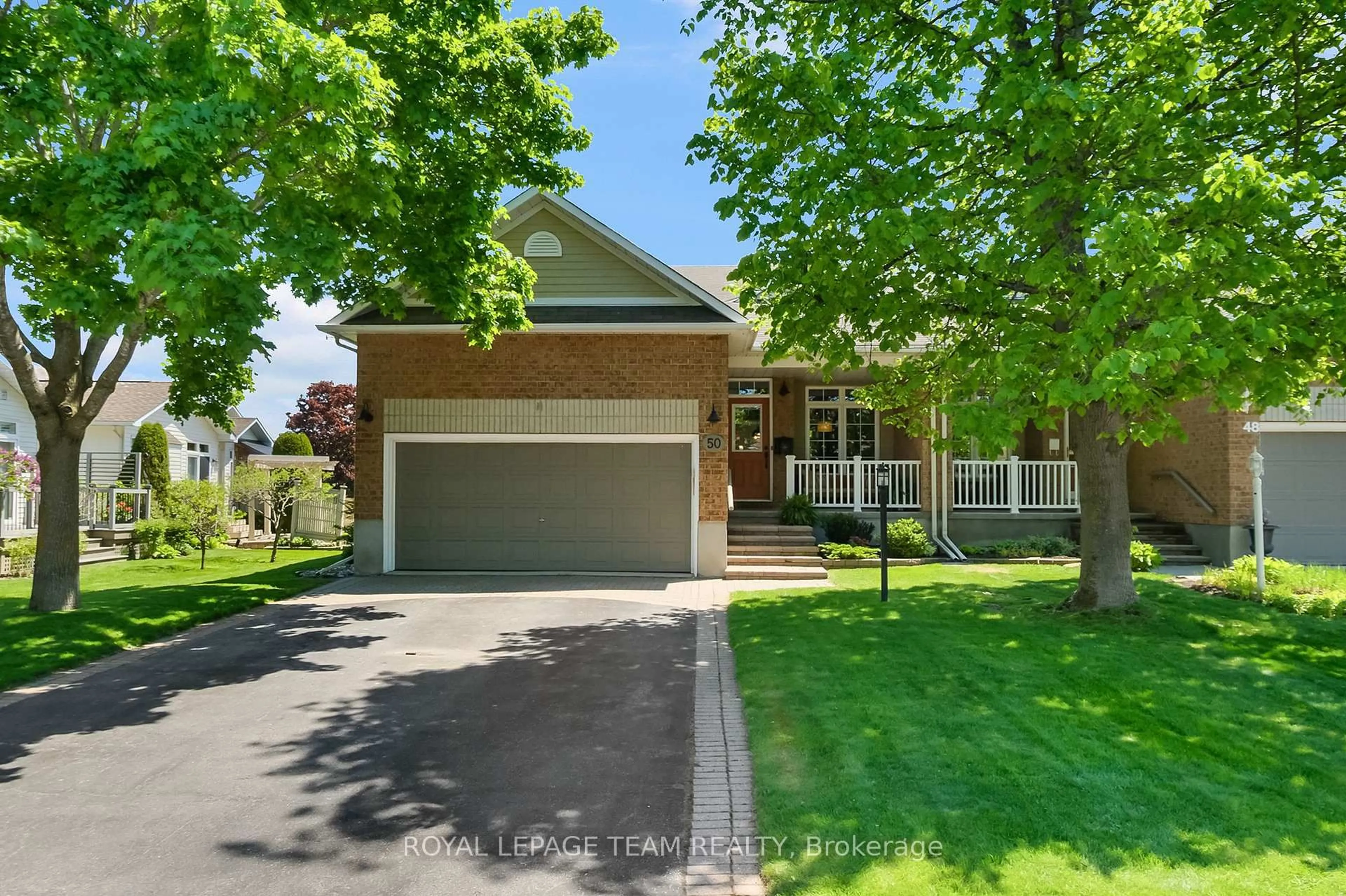 Home with brick exterior material, street for 50 Sable Run Dr, Ottawa Ontario K2S 1W7