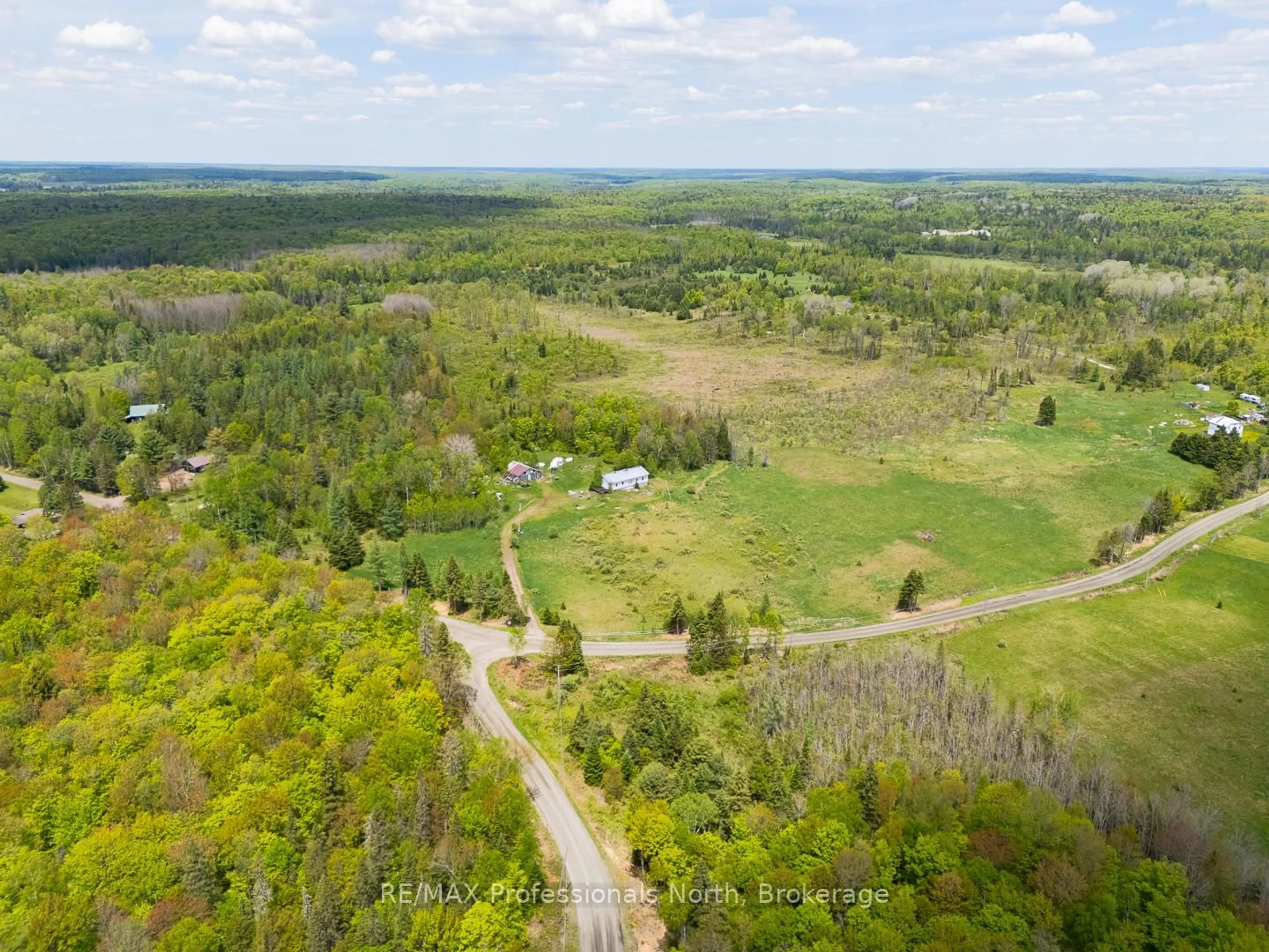 A pic from outside/outdoor area/front of a property/back of a property/a pic from drone, forest/trees view for 1468 Nelson Lake Rd, Magnetawan Ontario P0A 1P0