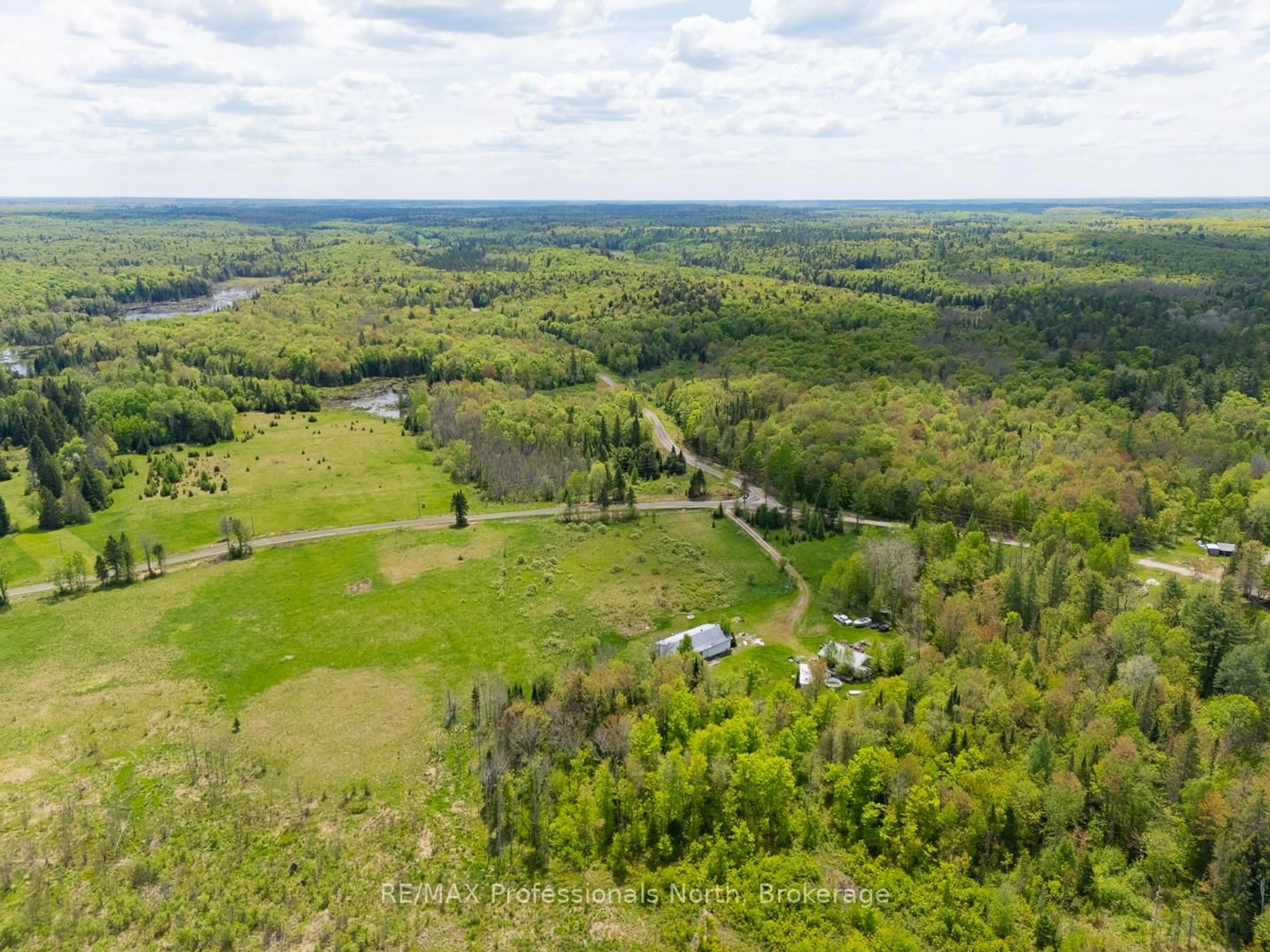 A pic from outside/outdoor area/front of a property/back of a property/a pic from drone, forest/trees view for 1468 Nelson Lake Rd, Magnetawan Ontario P0A 1P0