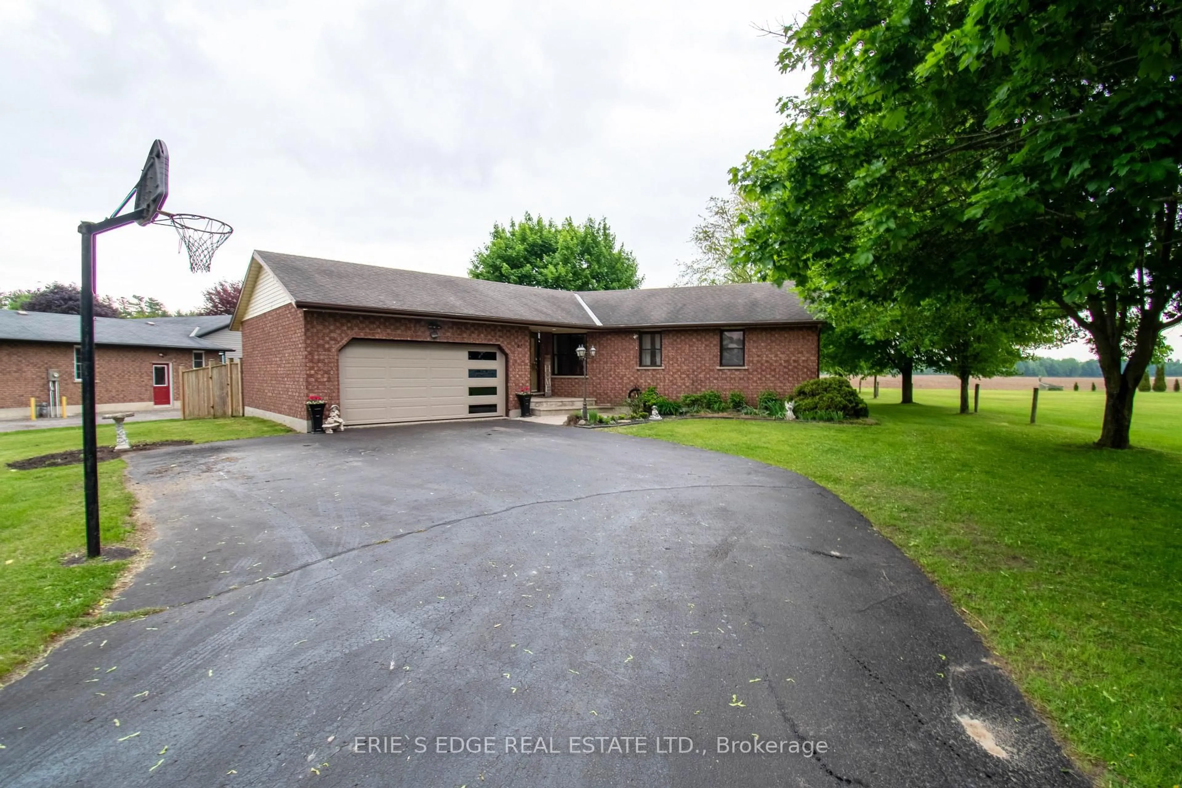 A pic from outside/outdoor area/front of a property/back of a property/a pic from drone, street for 56057 Heritage Line, Bayham Ontario N0J 1Y0