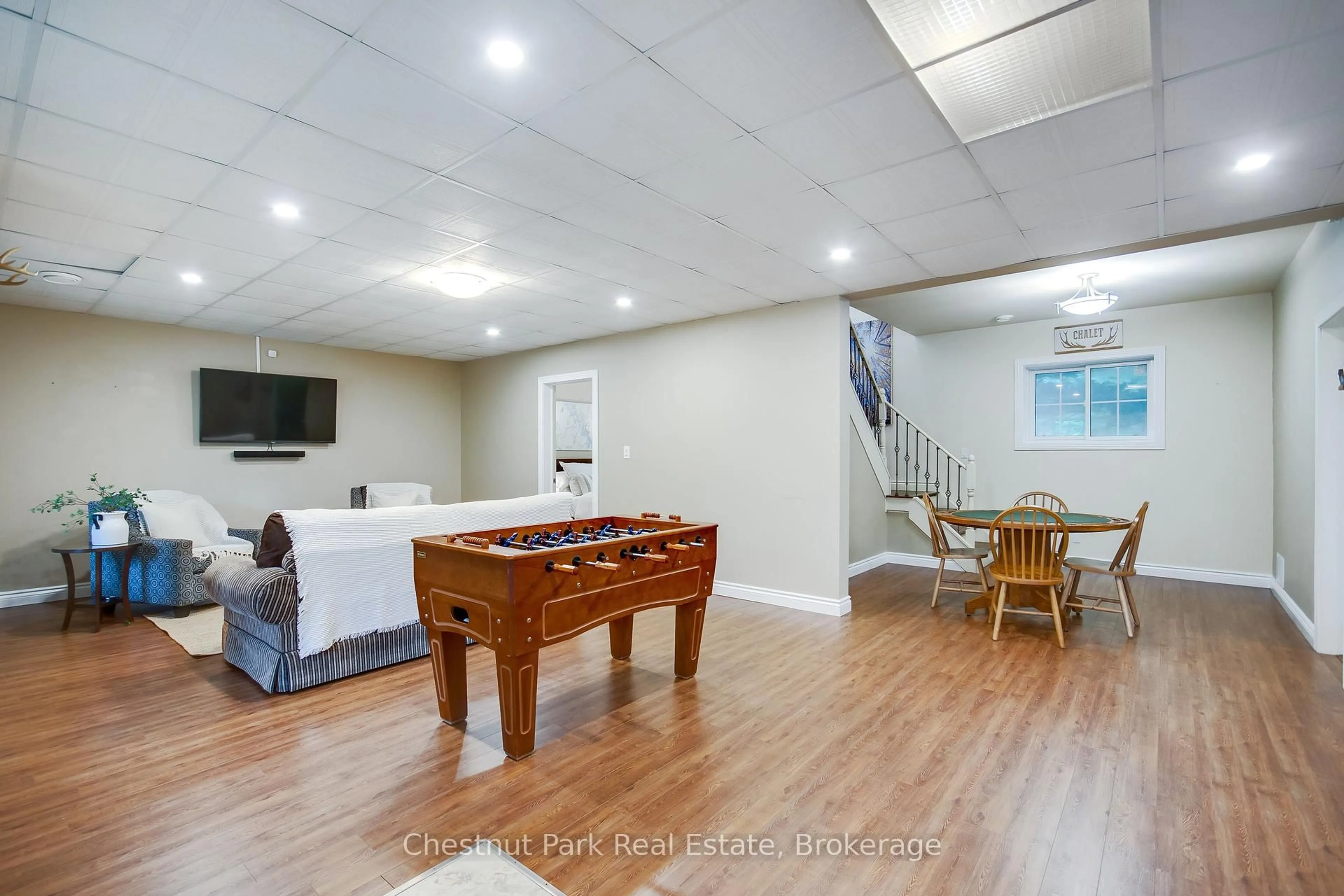 Living room with furniture, unknown for 132 WOODLAND Dr, Huntsville Ontario P1H 1A7
