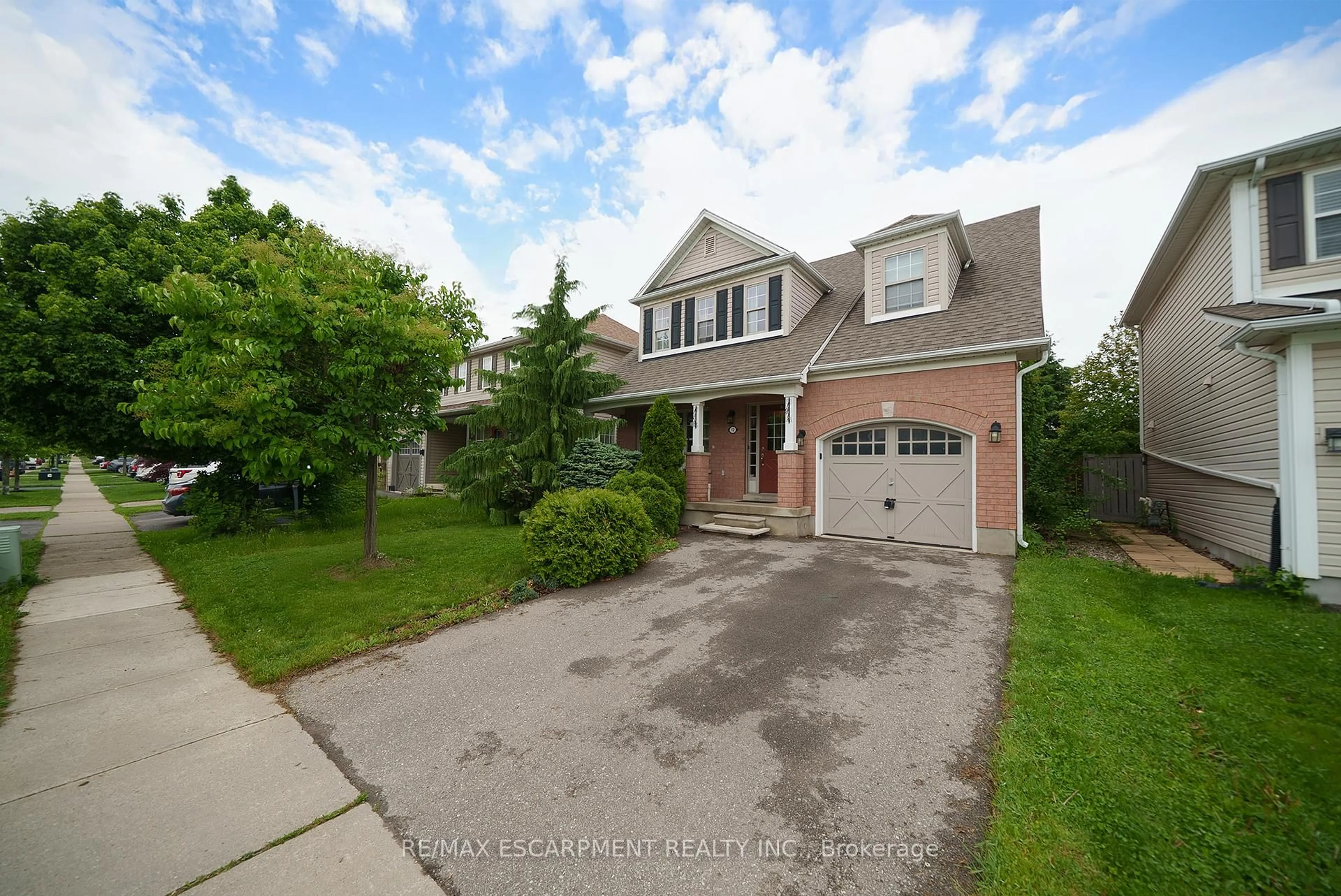 A pic from outside/outdoor area/front of a property/back of a property/a pic from drone, street for 12 Gaydon Way, Brantford Ontario N3T 6P9