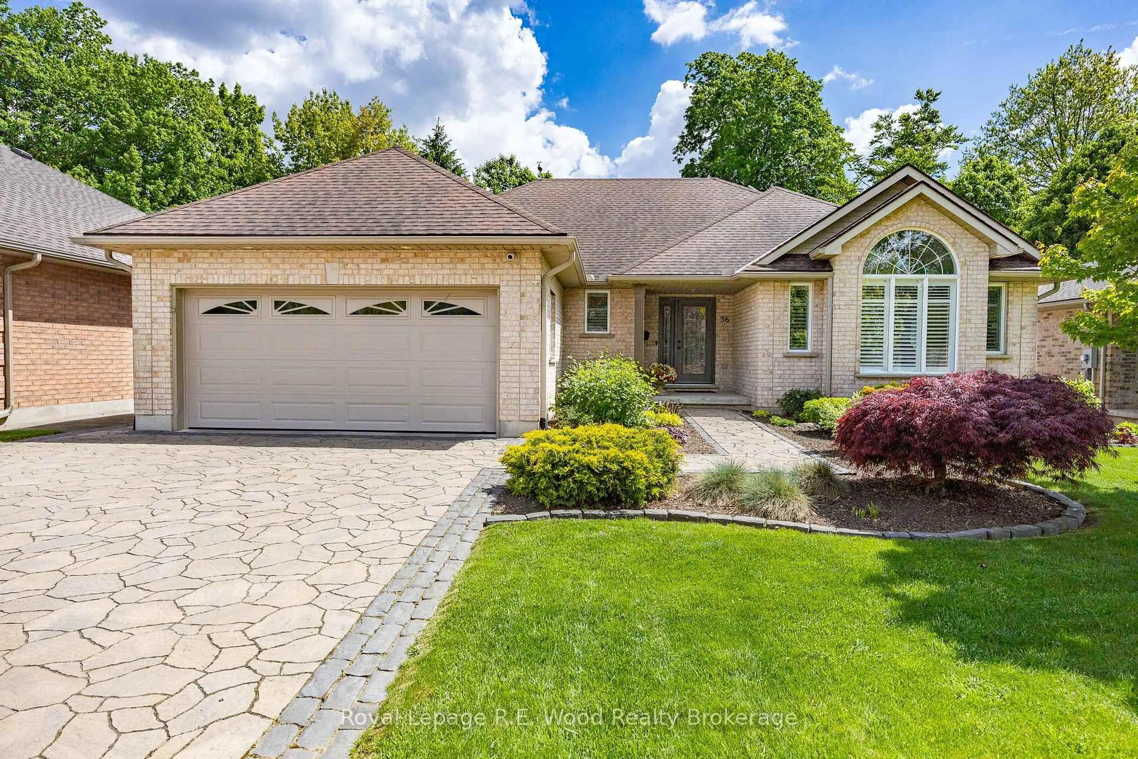 Home with brick exterior material, street for 36 Woodland Cres, Tillsonburg Ontario N4G 5R5