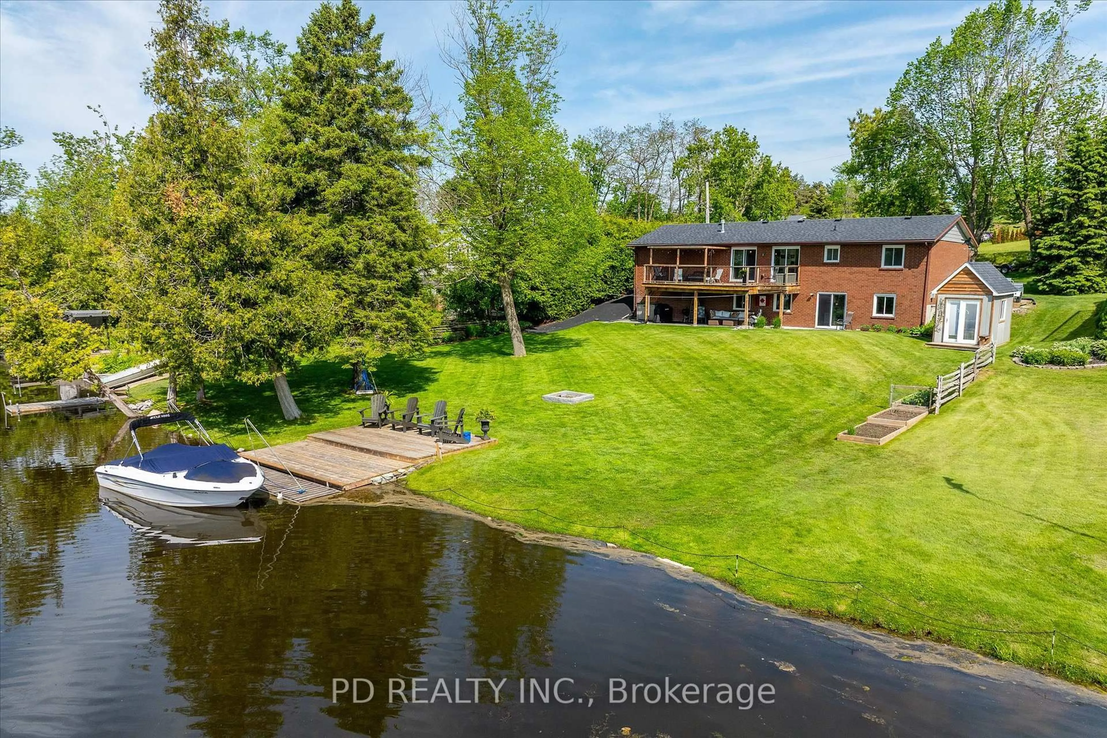 A pic from outside/outdoor area/front of a property/back of a property/a pic from drone, water/lake/river/ocean view for 112 Clearview Dr, Kawartha Lakes Ontario K0L 2W0