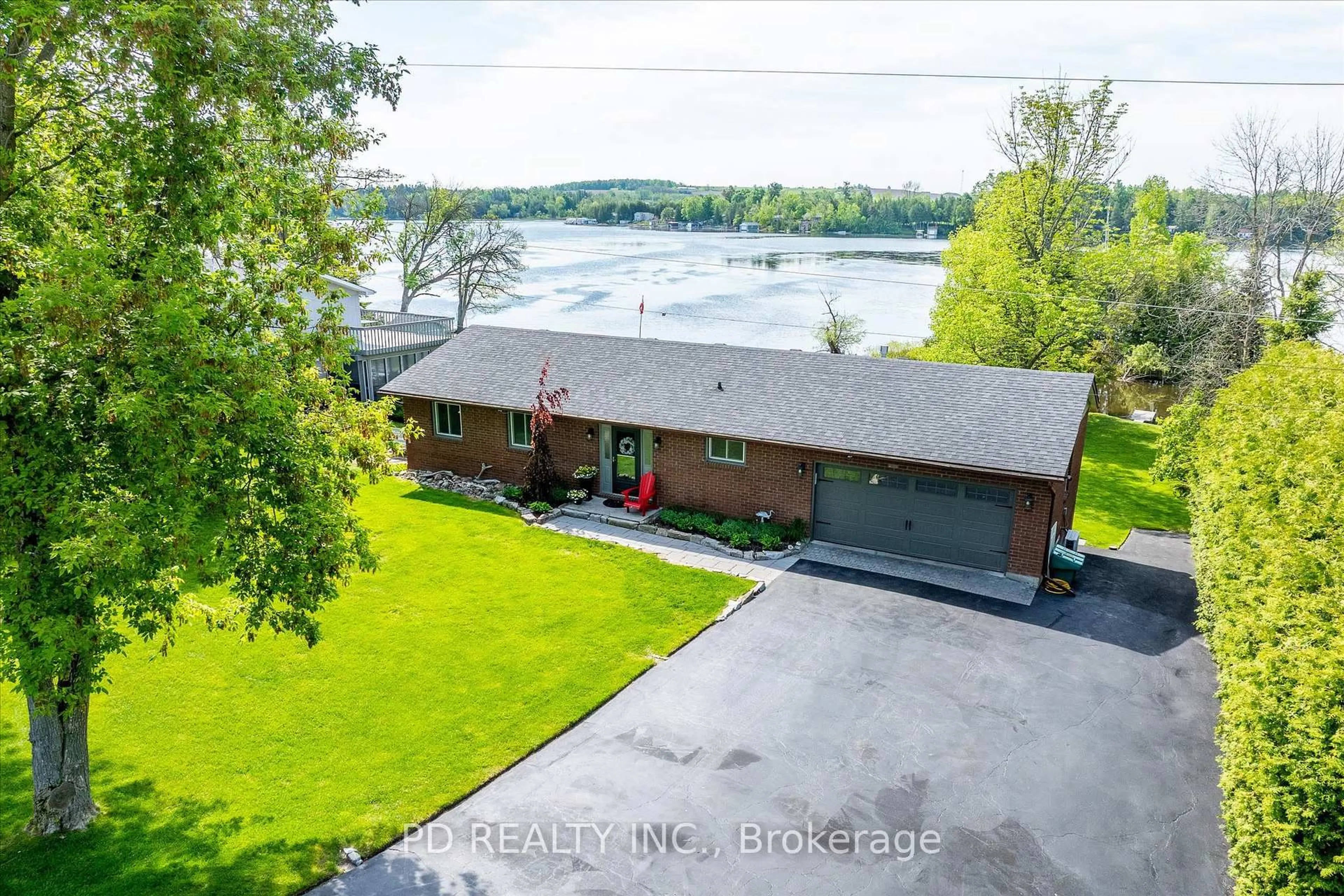 A pic from outside/outdoor area/front of a property/back of a property/a pic from drone, water/lake/river/ocean view for 112 Clearview Dr, Kawartha Lakes Ontario K0L 2W0