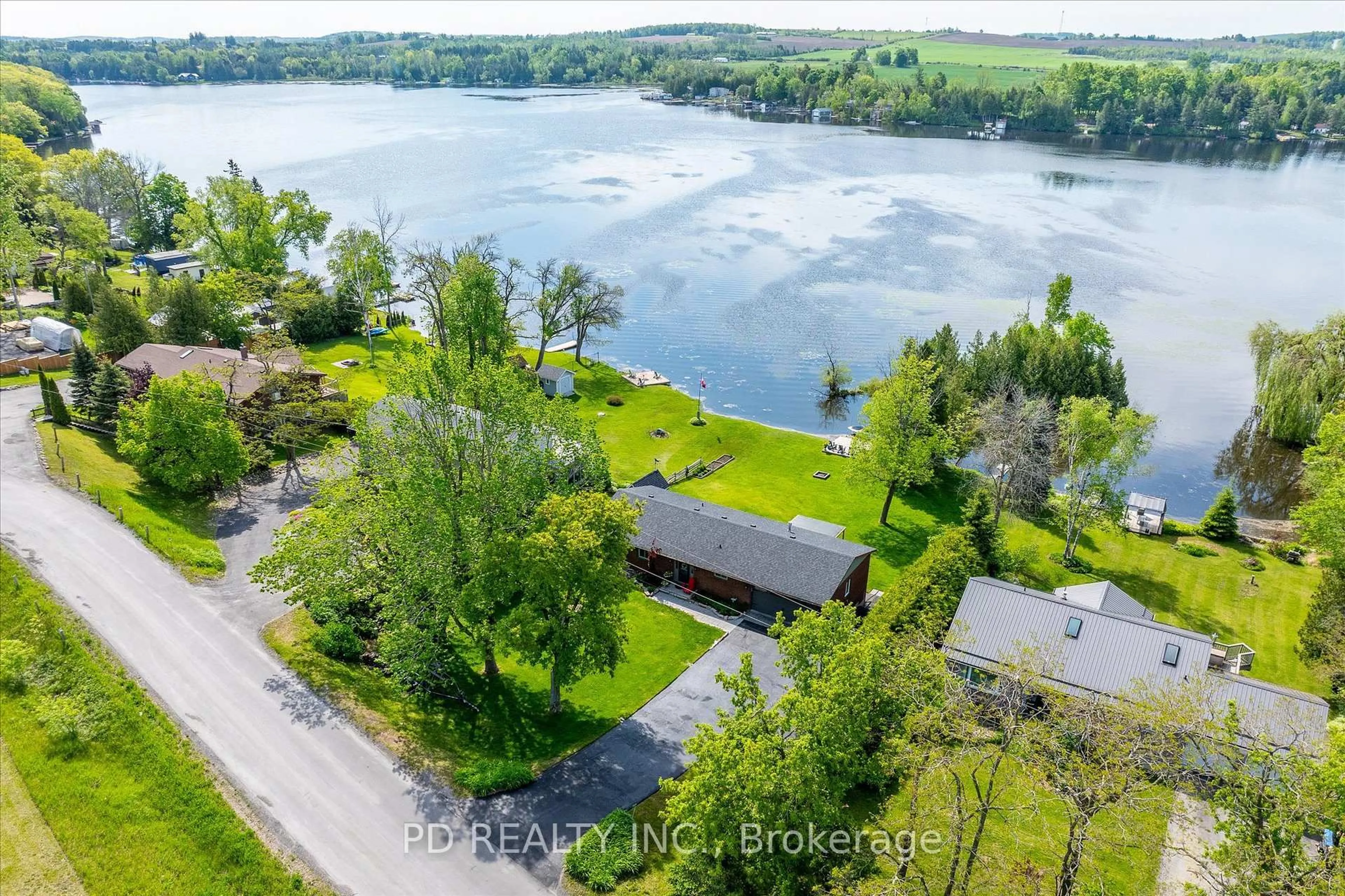 A pic from outside/outdoor area/front of a property/back of a property/a pic from drone, water/lake/river/ocean view for 112 Clearview Dr, Kawartha Lakes Ontario K0L 2W0