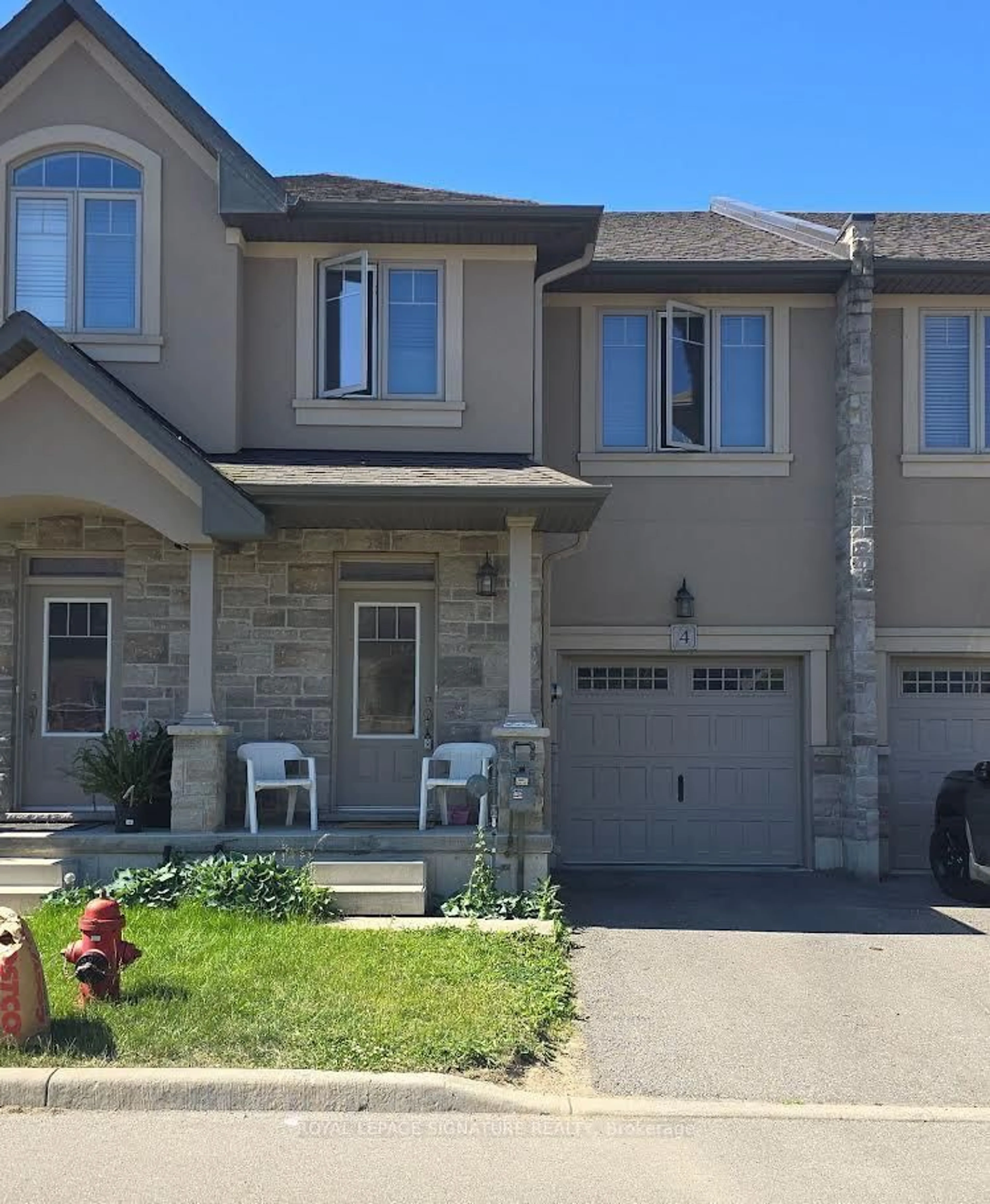 Home with vinyl exterior material, street for 98 Shoreview Pl #4, Hamilton Ontario L8E 0J4
