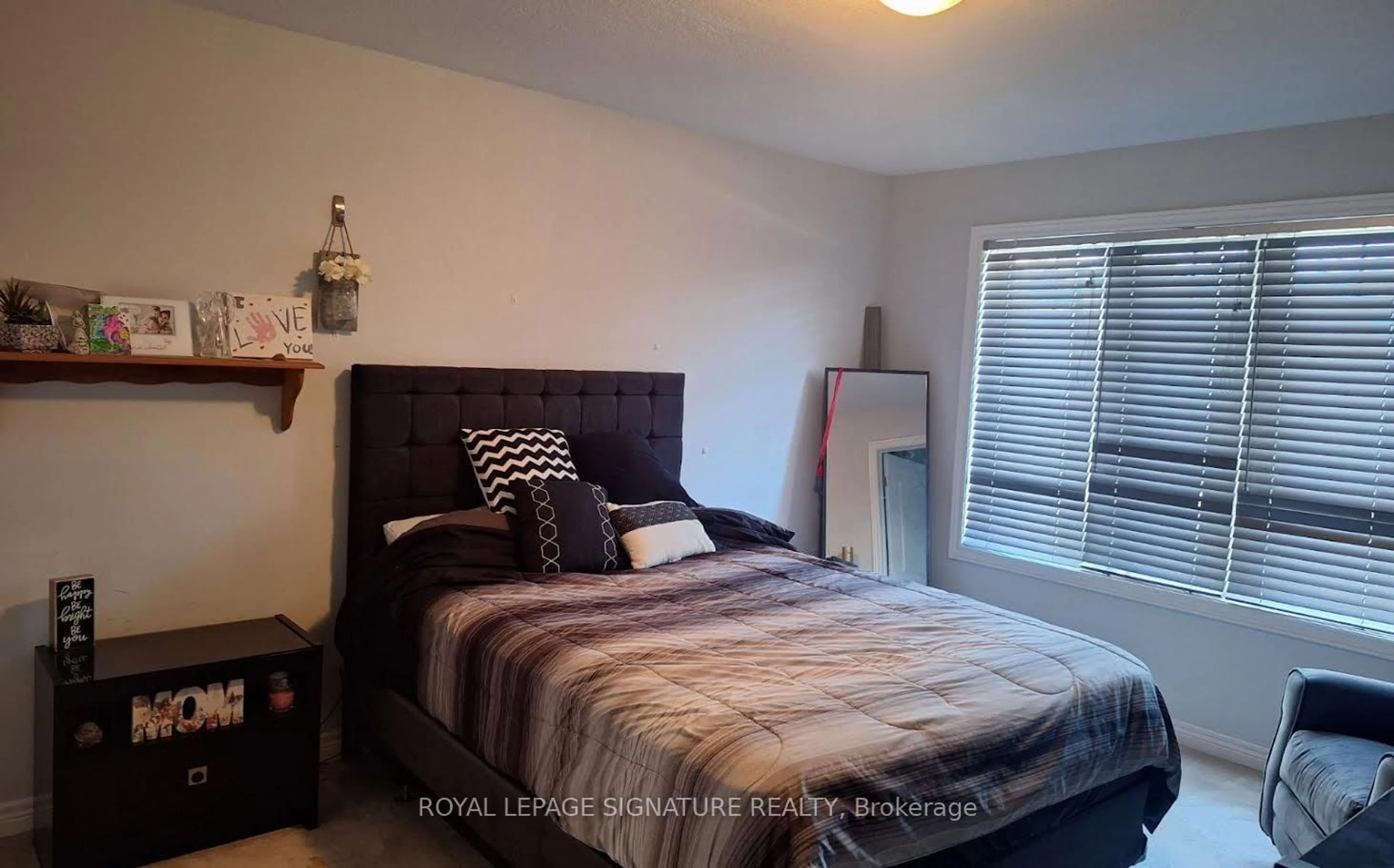 Bedroom with bed, wood/laminate floor for 98 Shoreview Pl #4, Hamilton Ontario L8E 0J4