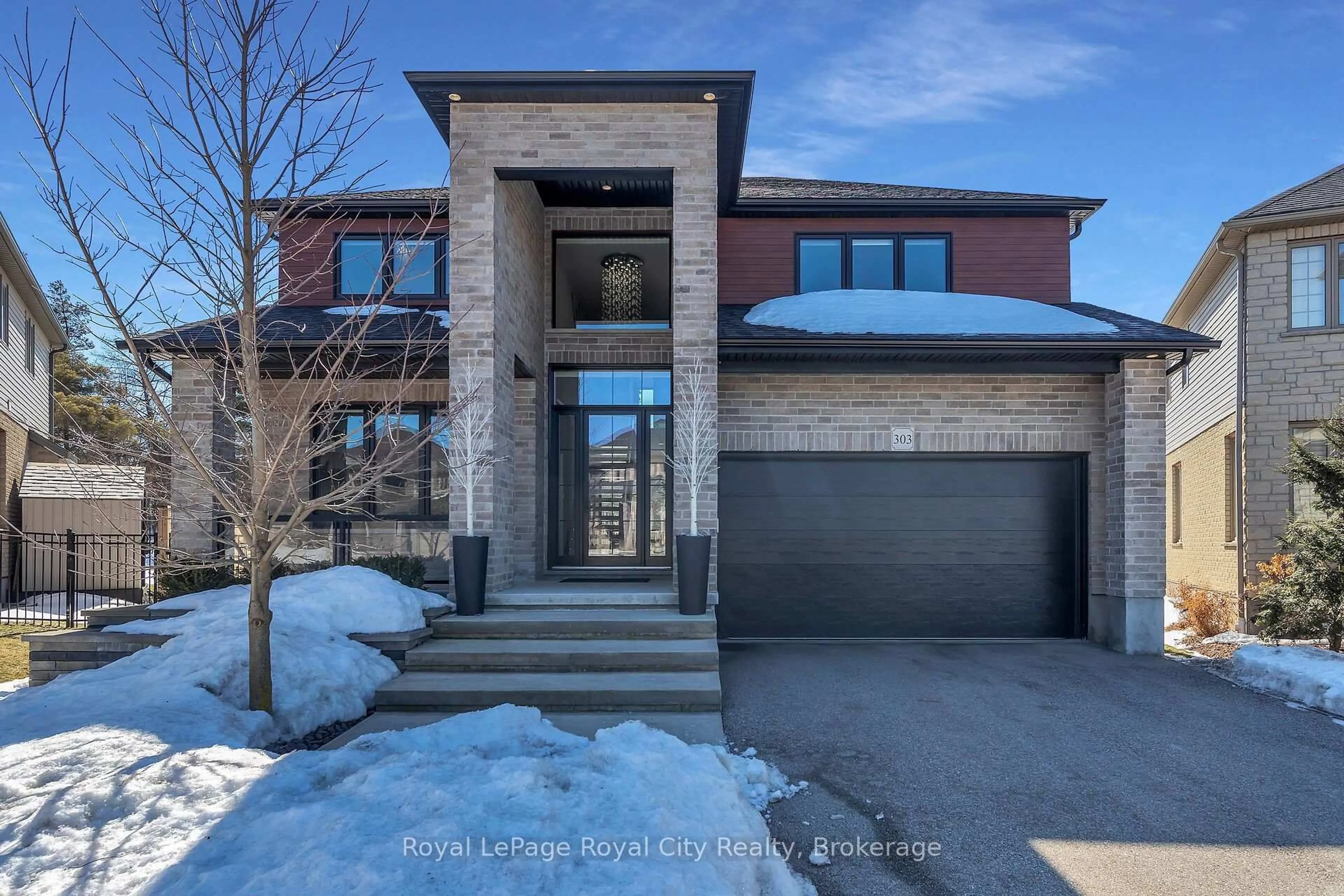 Home with brick exterior material, street for 303 Gosling Gdns, Guelph Ontario N1L 0M1