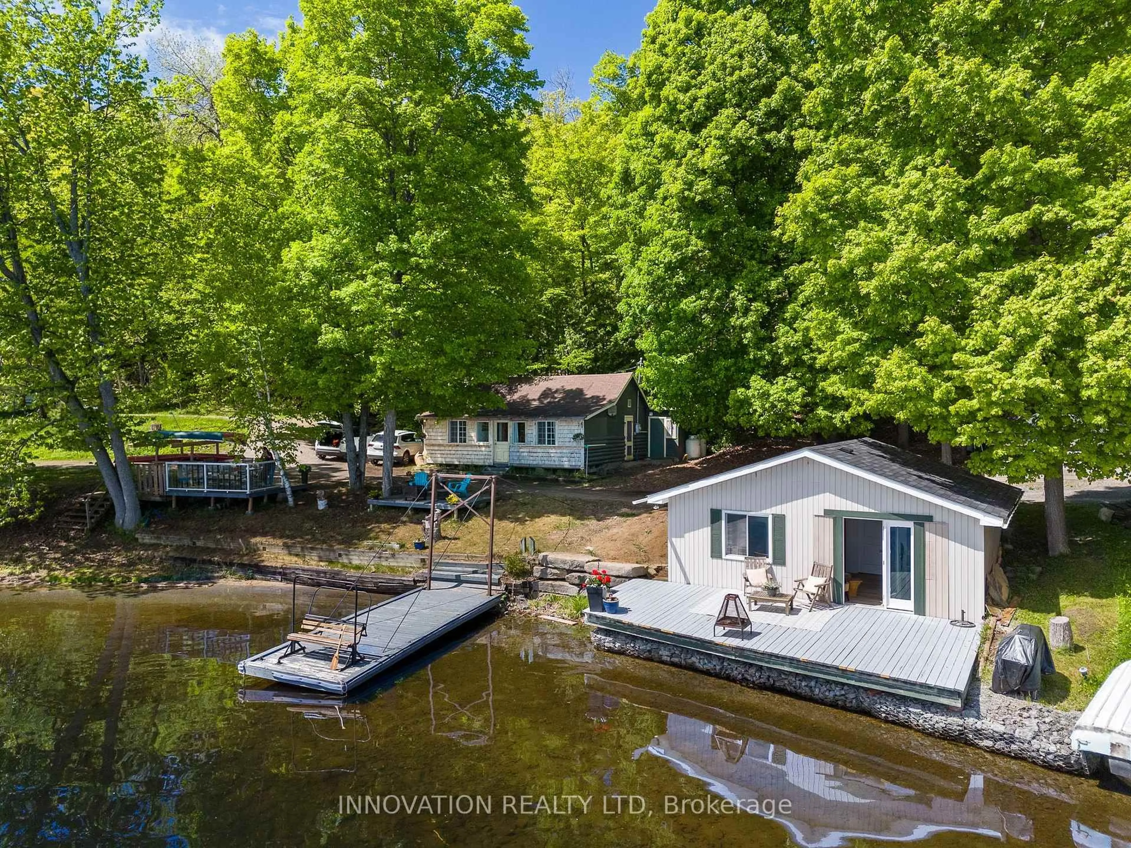 A pic from outside/outdoor area/front of a property/back of a property/a pic from drone, water/lake/river/ocean view for 56 Stubinskis Lane, Calabogie Ontario K0J 1H0