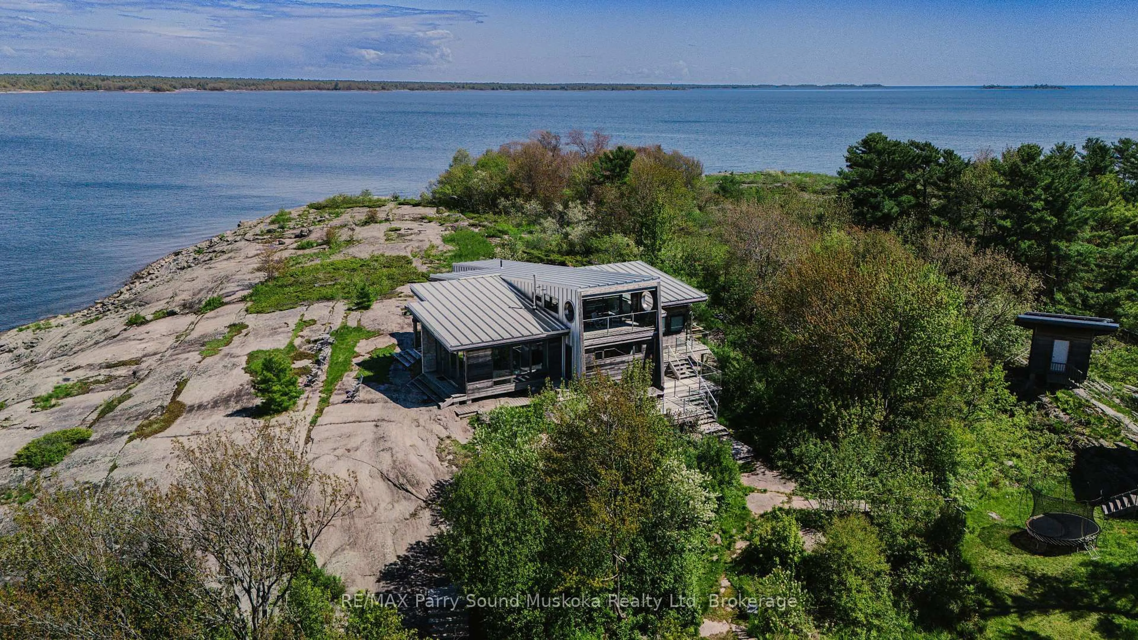 A pic from outside/outdoor area/front of a property/back of a property/a pic from drone, water/lake/river/ocean view for 1 B-821 Anchor Island N/A, The Archipelago Ontario P0G 1K0