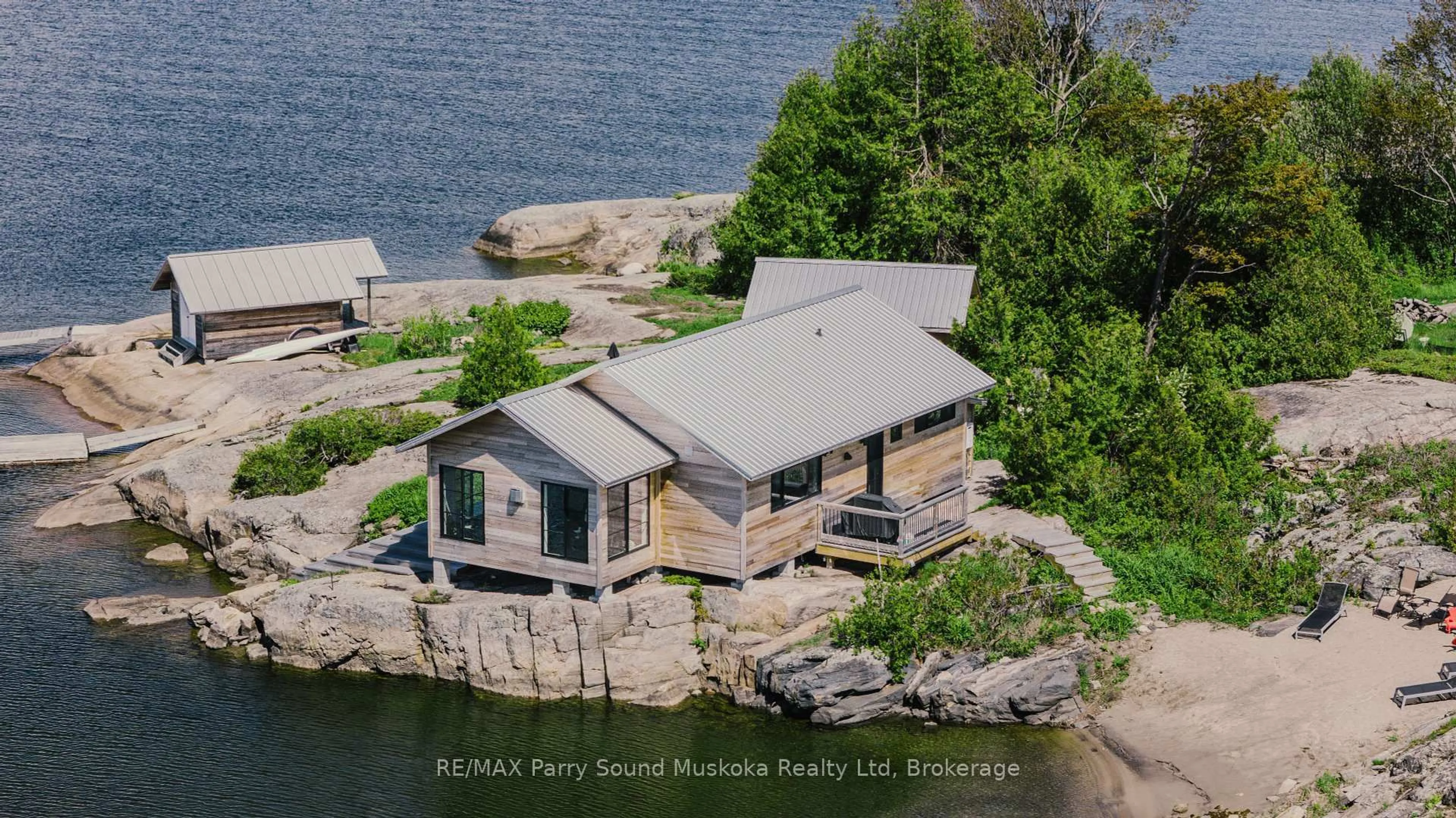 A pic from outside/outdoor area/front of a property/back of a property/a pic from drone, water/lake/river/ocean view for 1 B-821 Anchor Island N/A, The Archipelago Ontario P0G 1K0