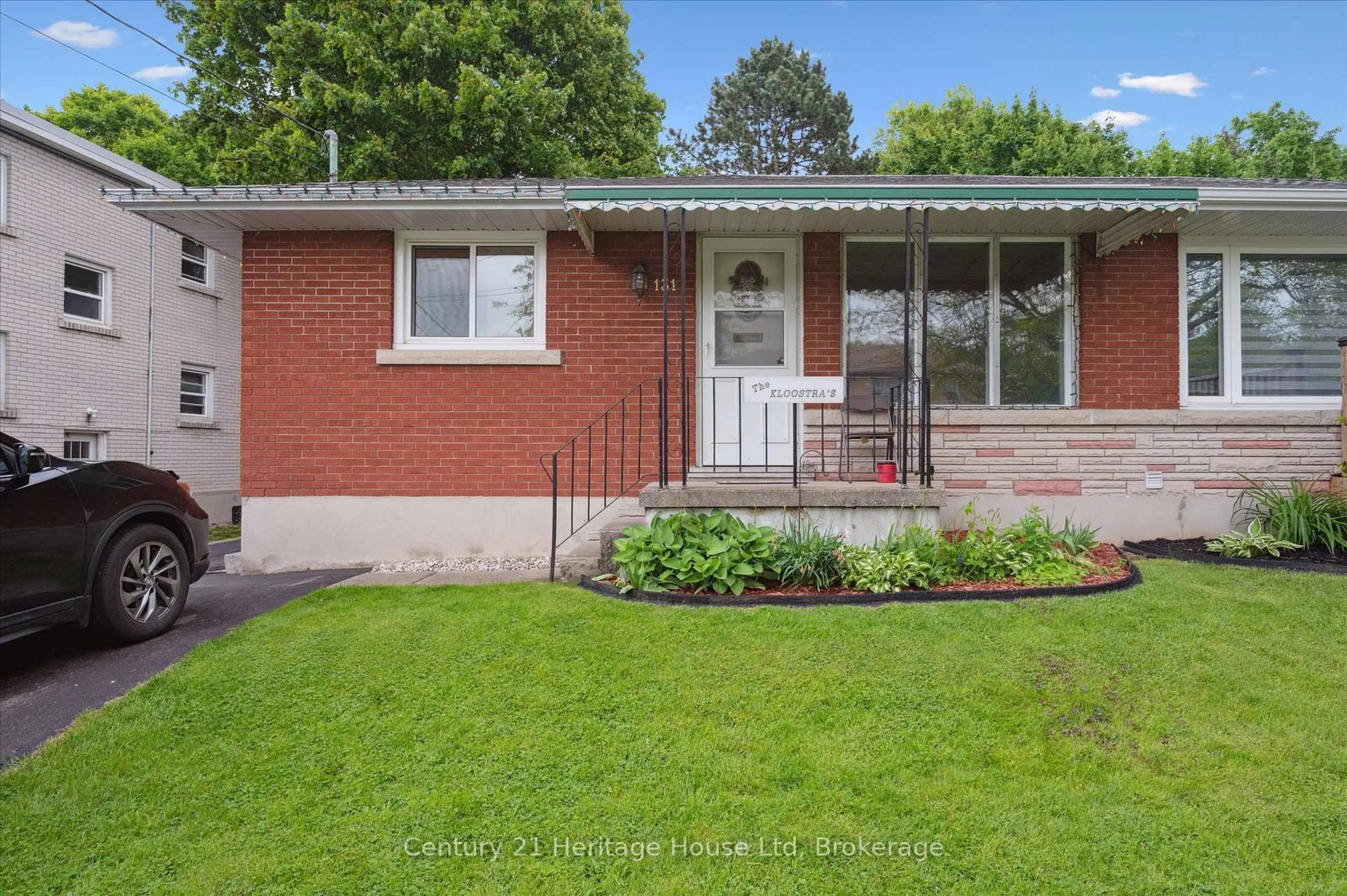 Home with brick exterior material, street for 131 Waverley Dr, Guelph Ontario N1E 1H1