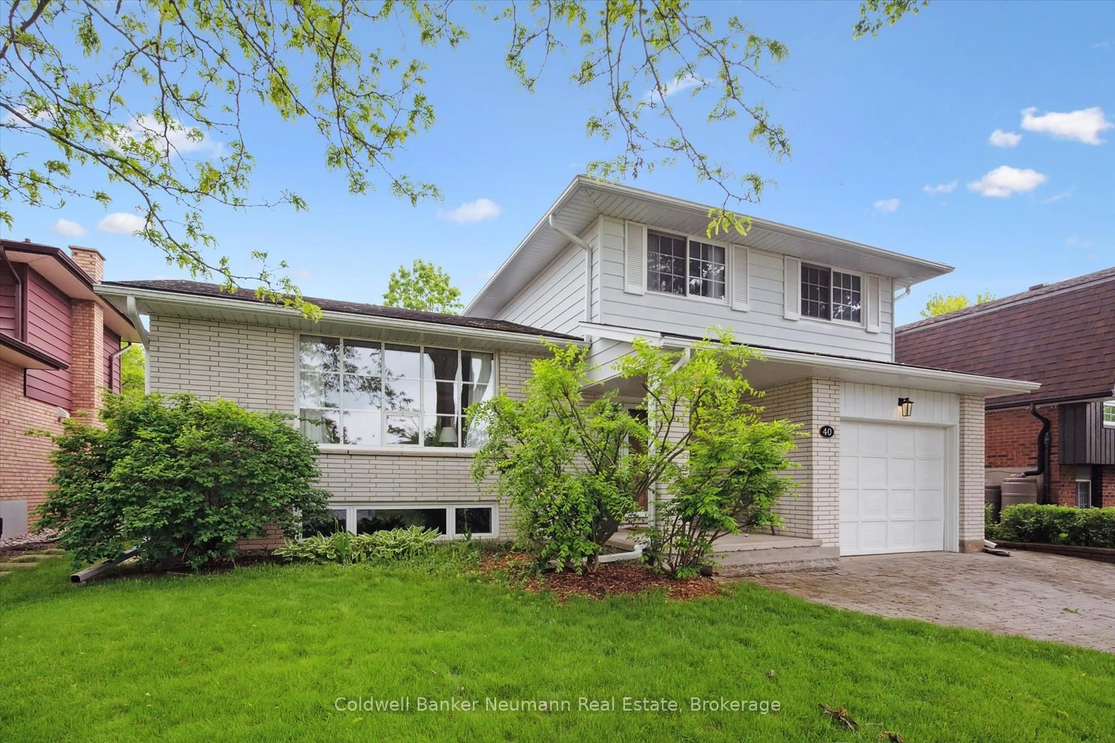 Home with vinyl exterior material, street for 40 Keats Cres, Guelph Ontario N1G 3B2