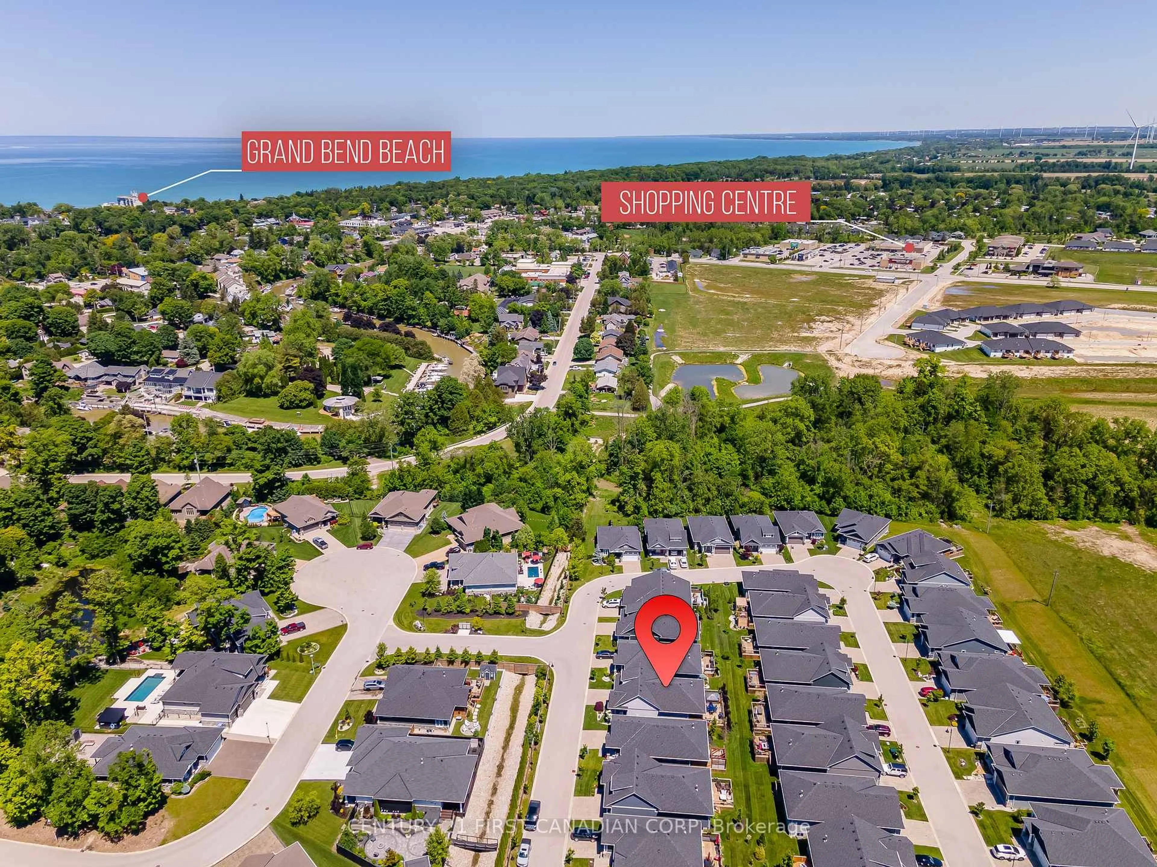 A pic from outside/outdoor area/front of a property/back of a property/a pic from drone, water/lake/river/ocean view for 7 Sunrise Lane, Lambton Shores Ontario N0M 1T0