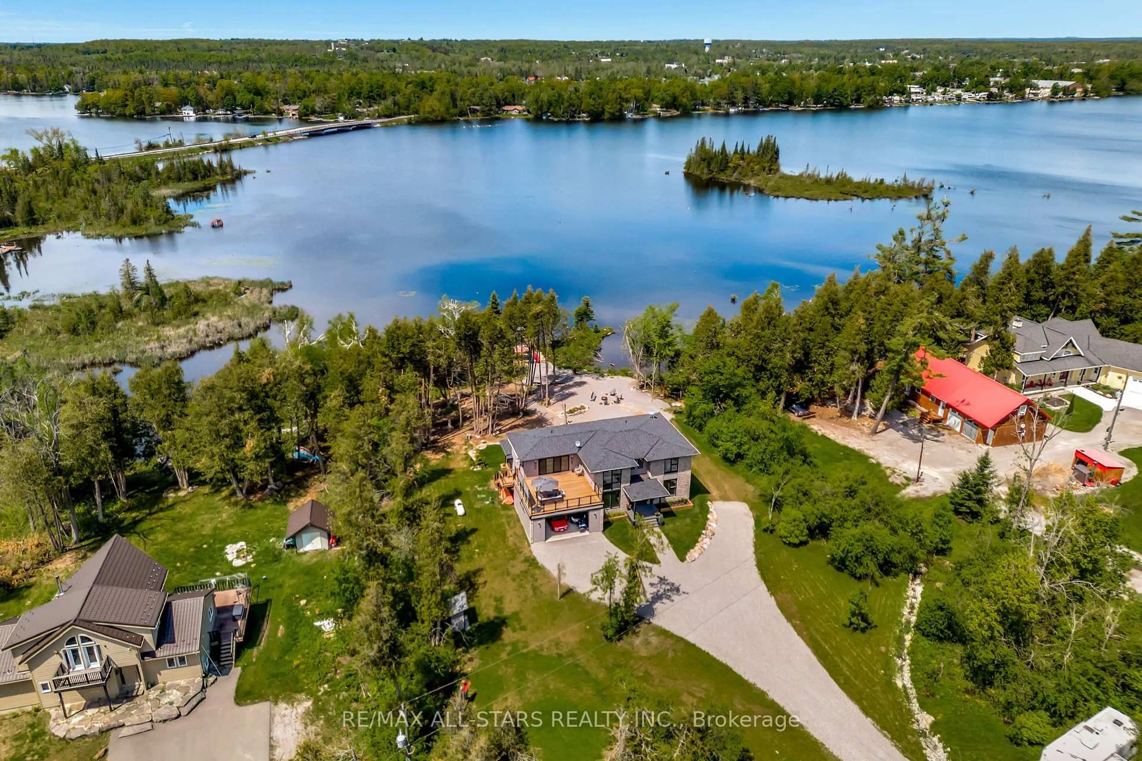 A pic from outside/outdoor area/front of a property/back of a property/a pic from drone, water/lake/river/ocean view for 15 Berry Lane, Kawartha Lakes Ontario K0M 1A0