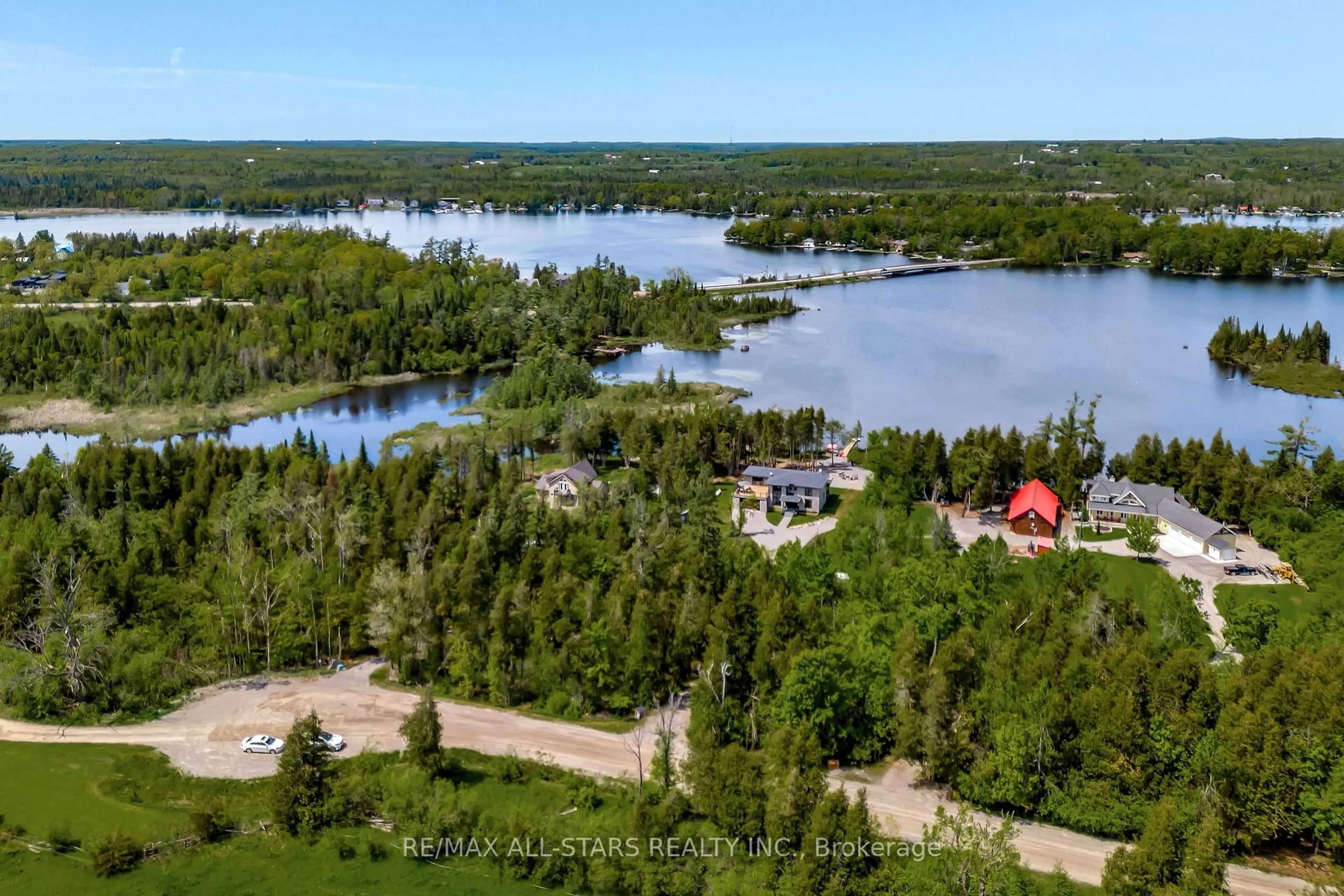 A pic from outside/outdoor area/front of a property/back of a property/a pic from drone, water/lake/river/ocean view for 15 Berry Lane, Kawartha Lakes Ontario K0M 1A0