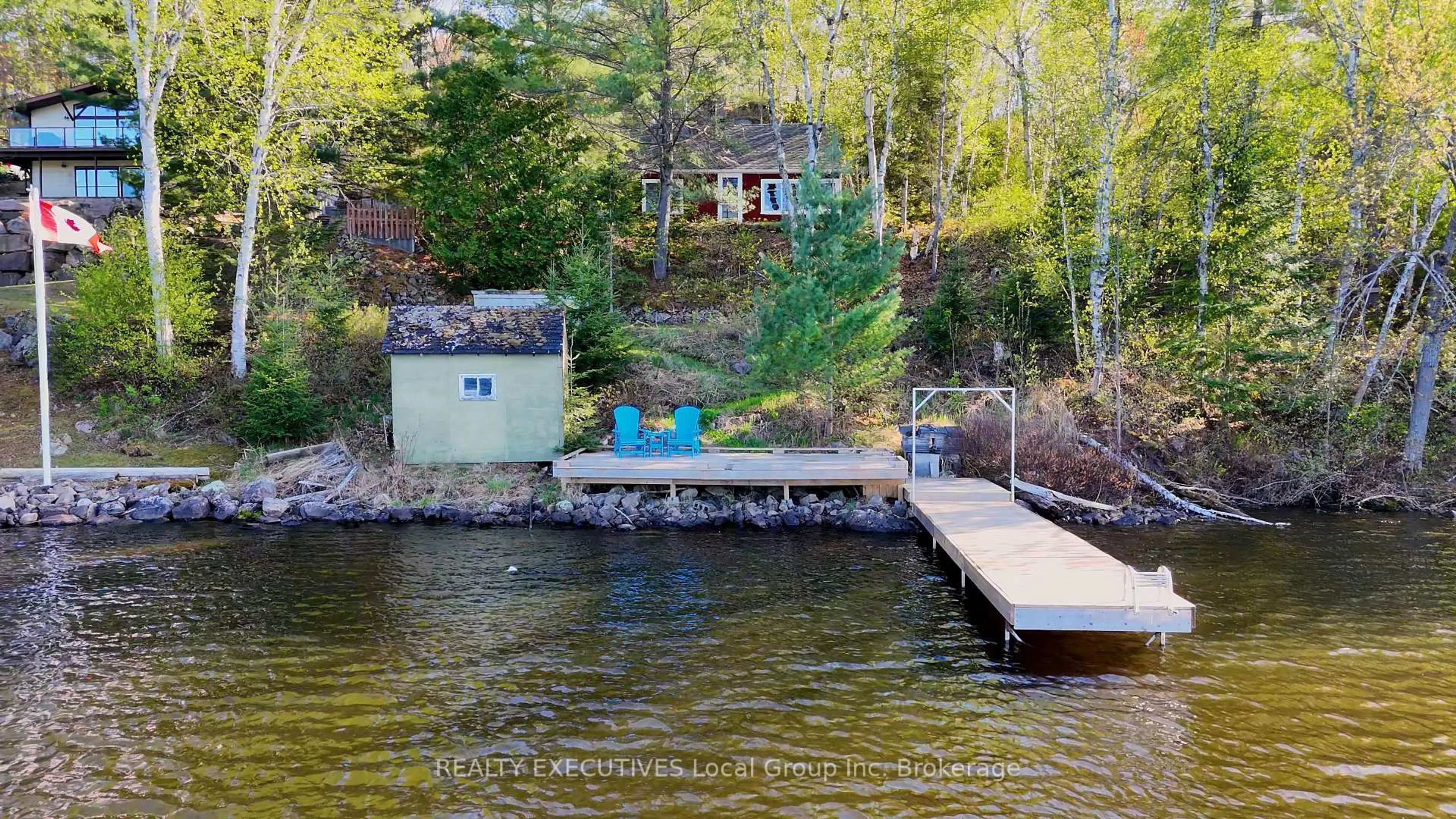 A pic from outside/outdoor area/front of a property/back of a property/a pic from drone, water/lake/river/ocean view for 137B PEBBLE BEACH Dr, Callander Ontario P0H 1H0
