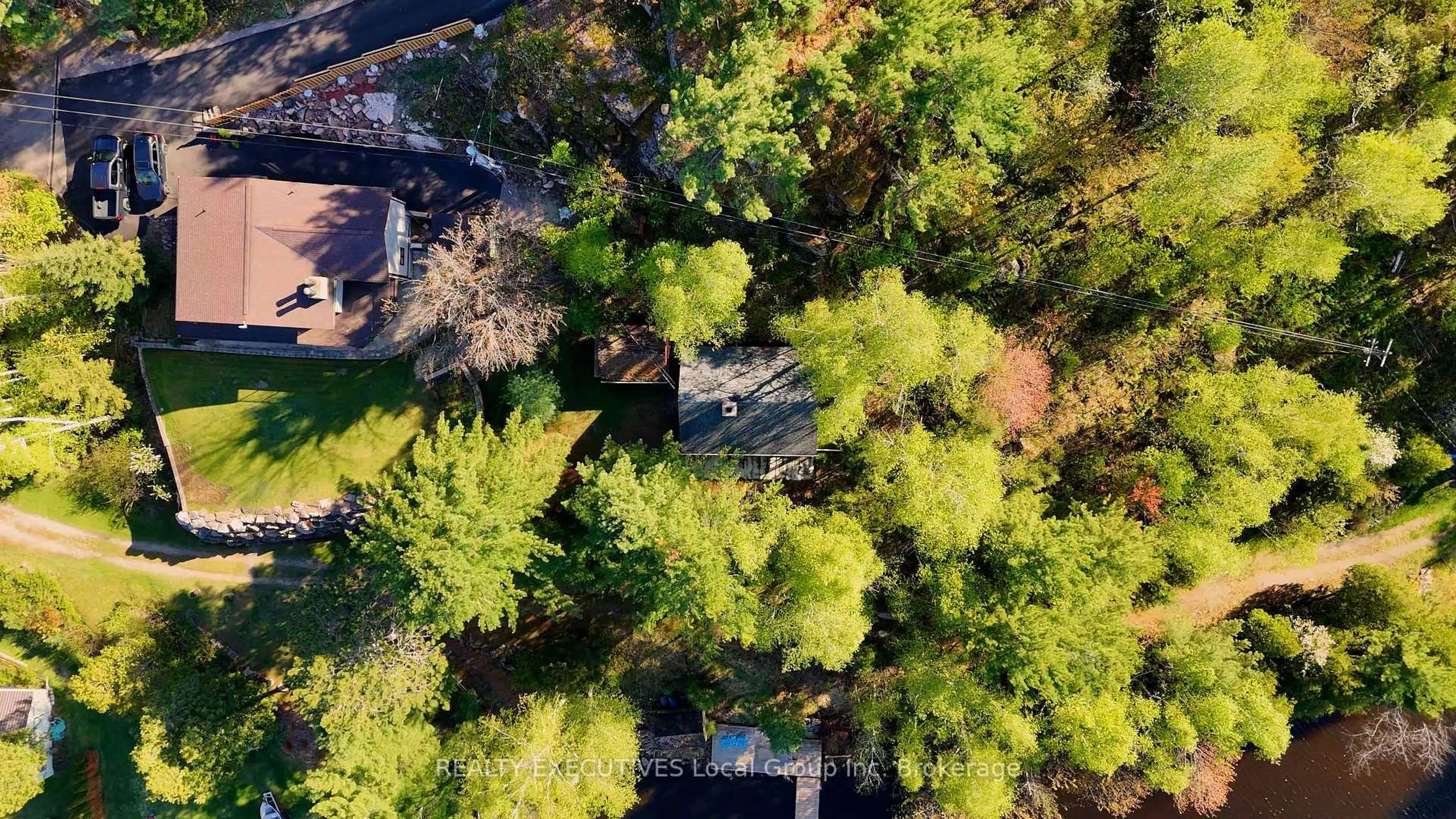 A pic from outside/outdoor area/front of a property/back of a property/a pic from drone, forest/trees view for 137B PEBBLE BEACH Dr, Callander Ontario P0H 1H0