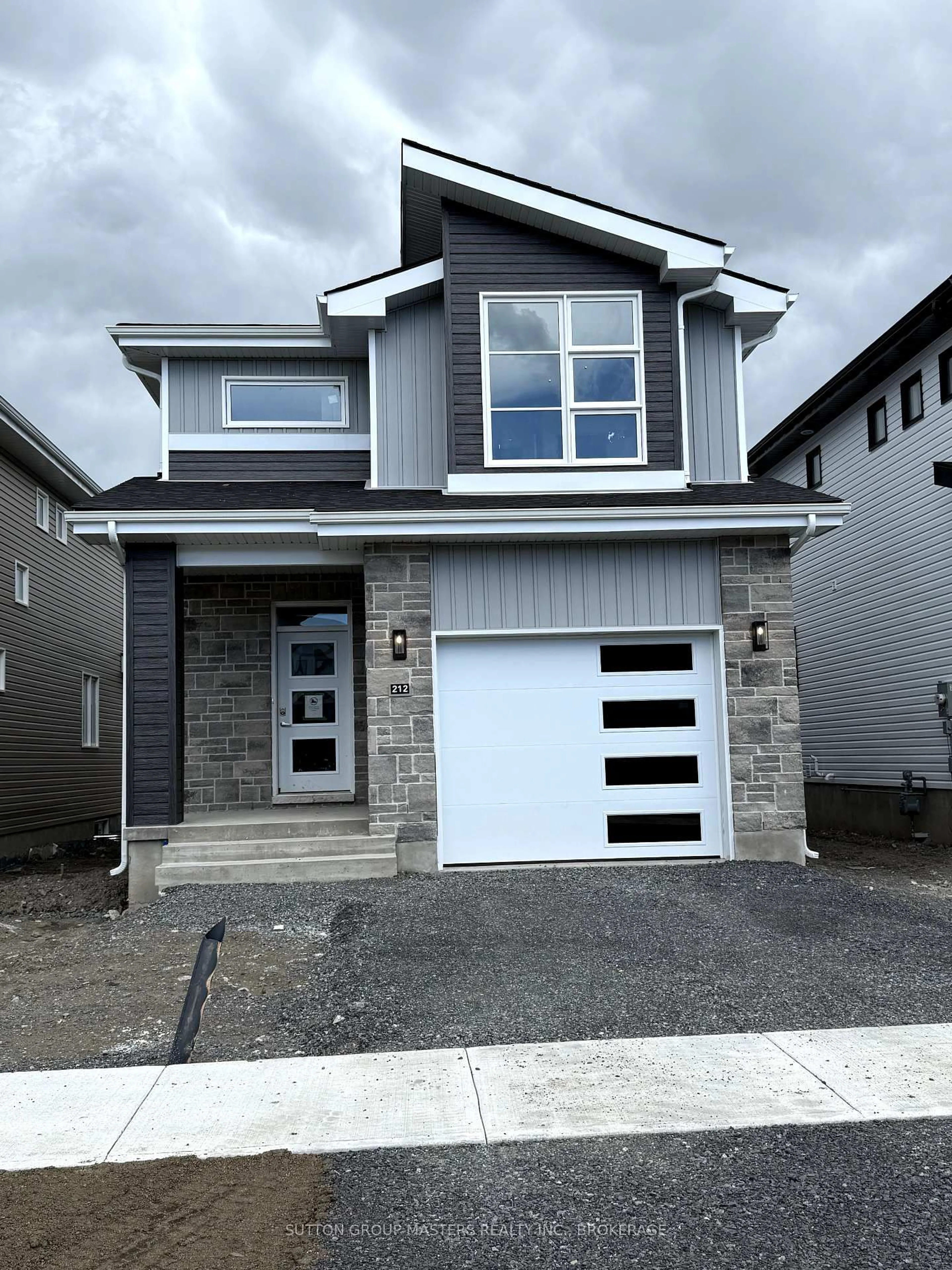 Home with vinyl exterior material, street for 212 Superior Dr, Loyalist Ontario K7N 0E5