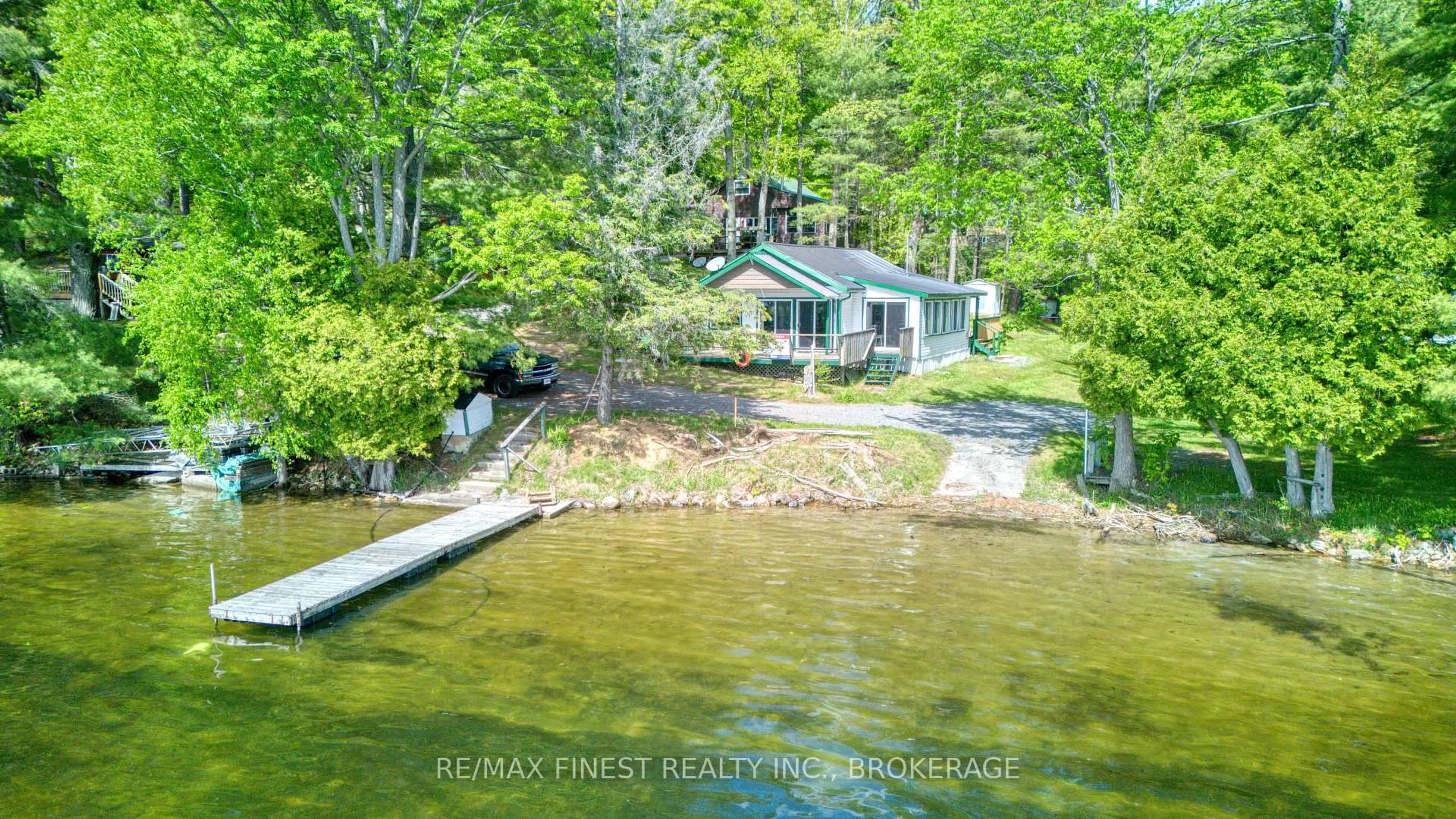 A pic from outside/outdoor area/front of a property/back of a property/a pic from drone, water/lake/river/ocean view for 131 Bobs Lake Lane 21a N/A, Maberly Ontario K0H 2B0