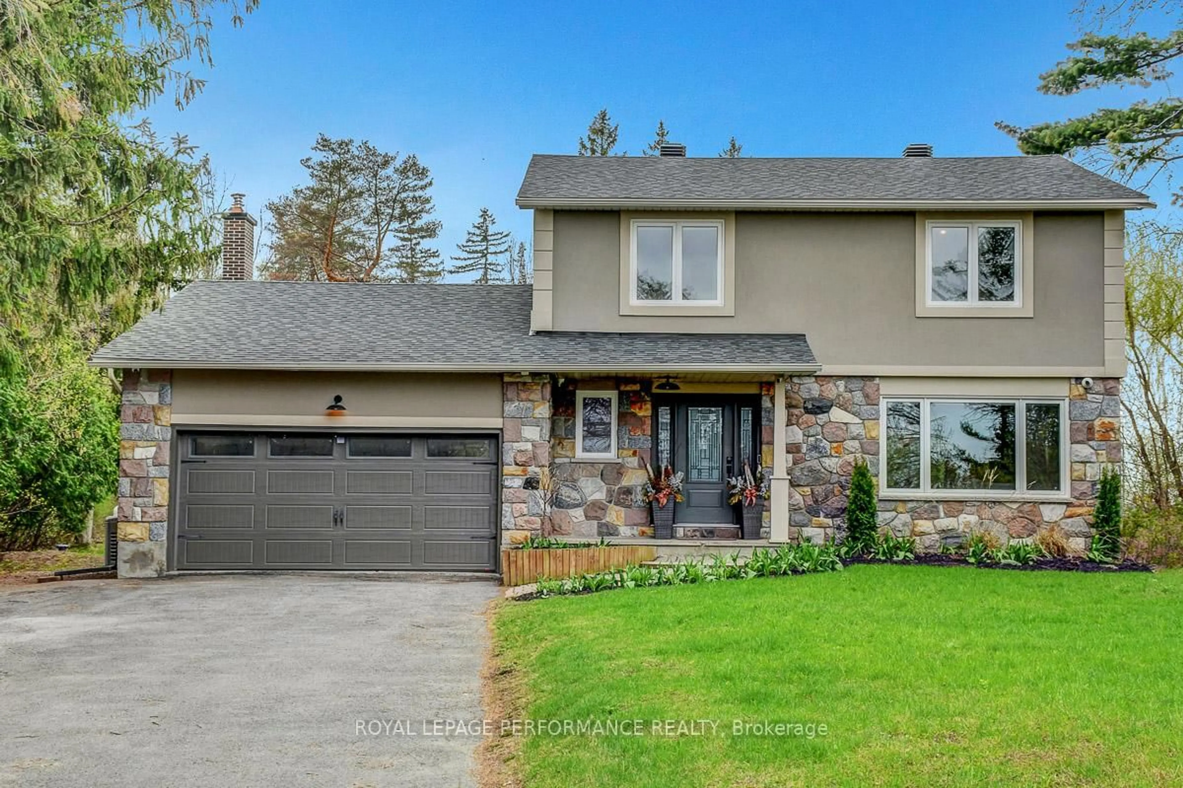 Home with brick exterior material, street for 2918 Prince Of Wales Dr, Ottawa Ontario K2C 3H1