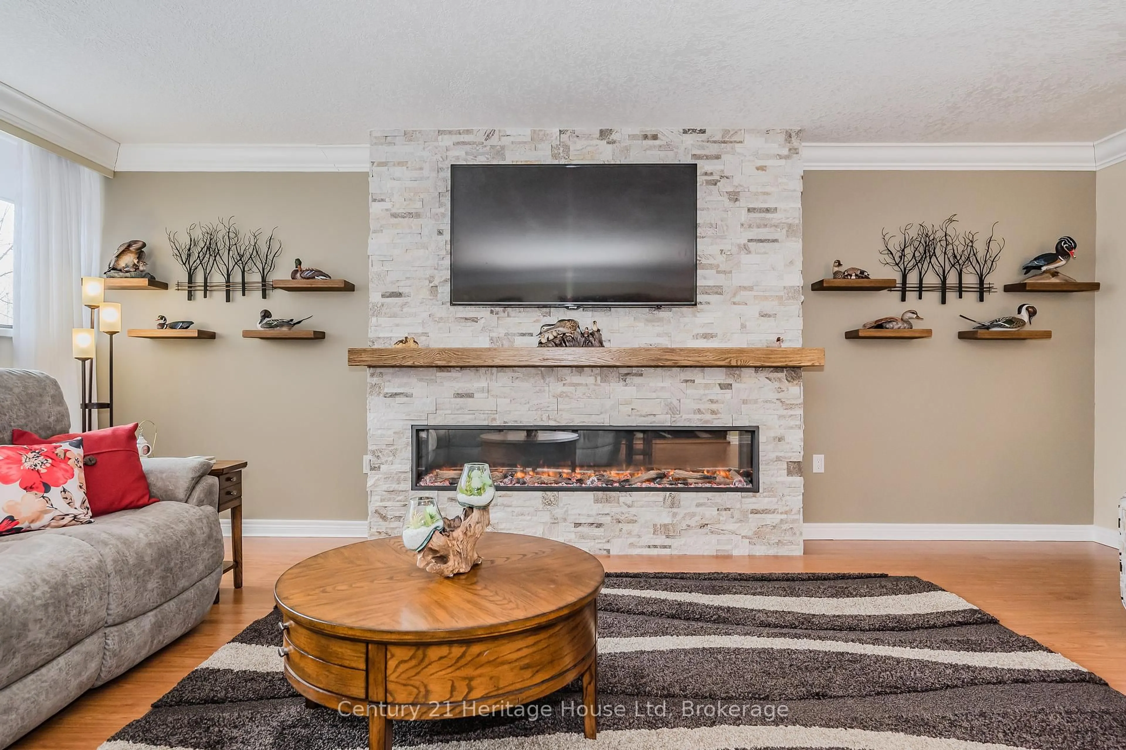 Living room with furniture, unknown for 93 Westwood Rd #306, Guelph Ontario N1H 7J6