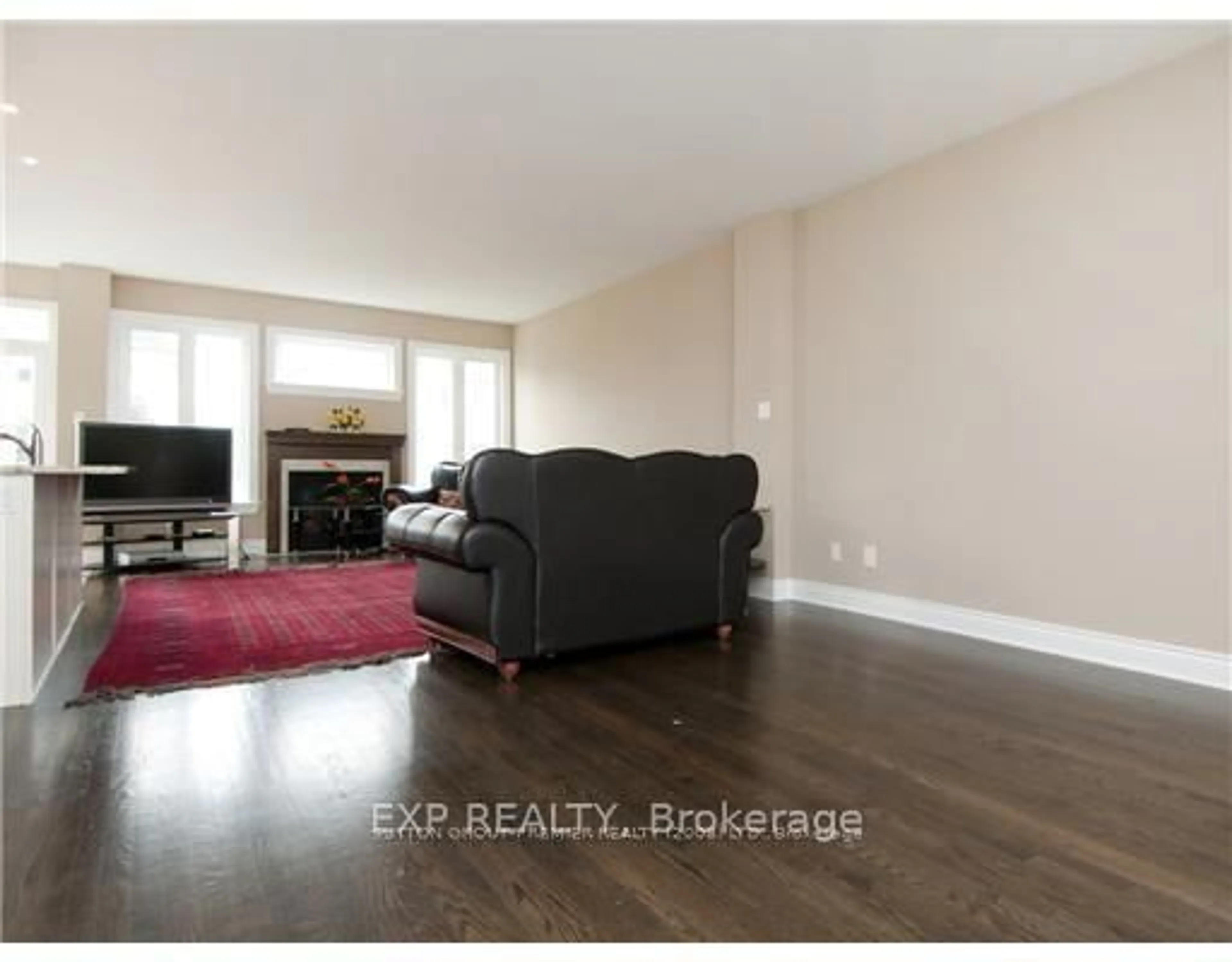 Living room with furniture, wood/laminate floor for 6793 BREANNA CARDILL St, Greely Ontario K4P 0C3