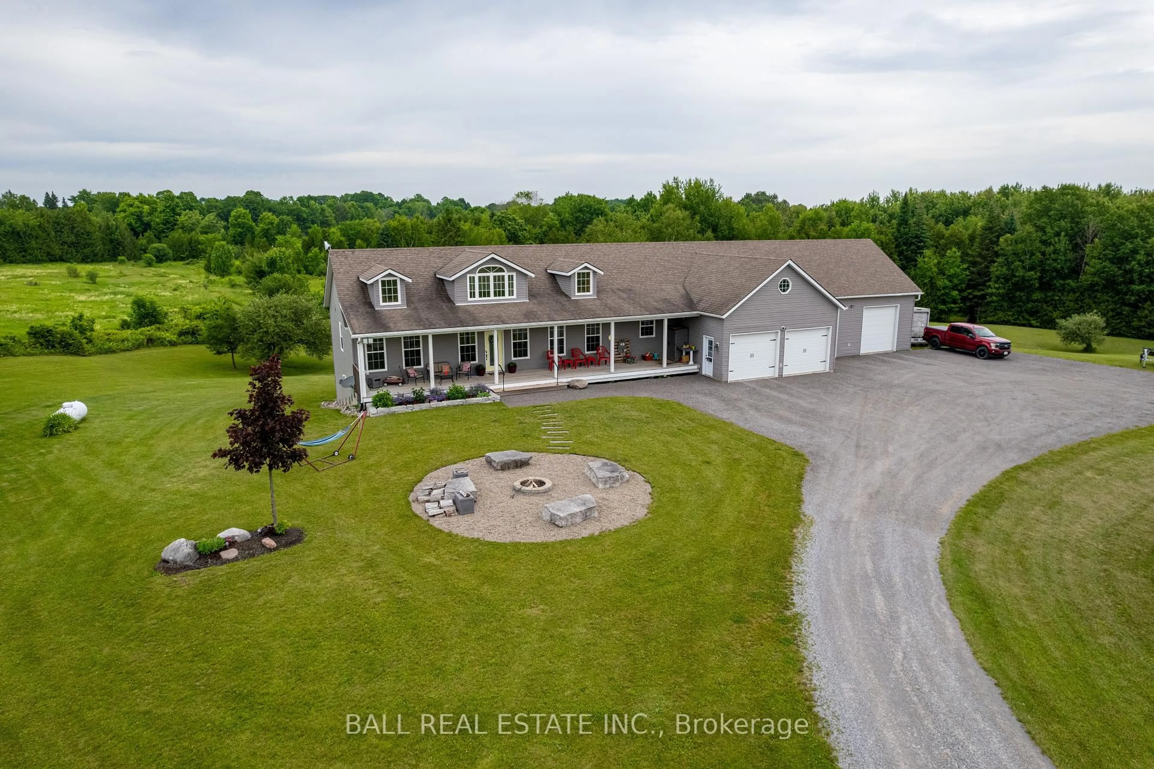 A pic from outside/outdoor area/front of a property/back of a property/a pic from drone, water/lake/river/ocean view for 2120 Deer Bay Rd, Selwyn Ontario K0L 2H0