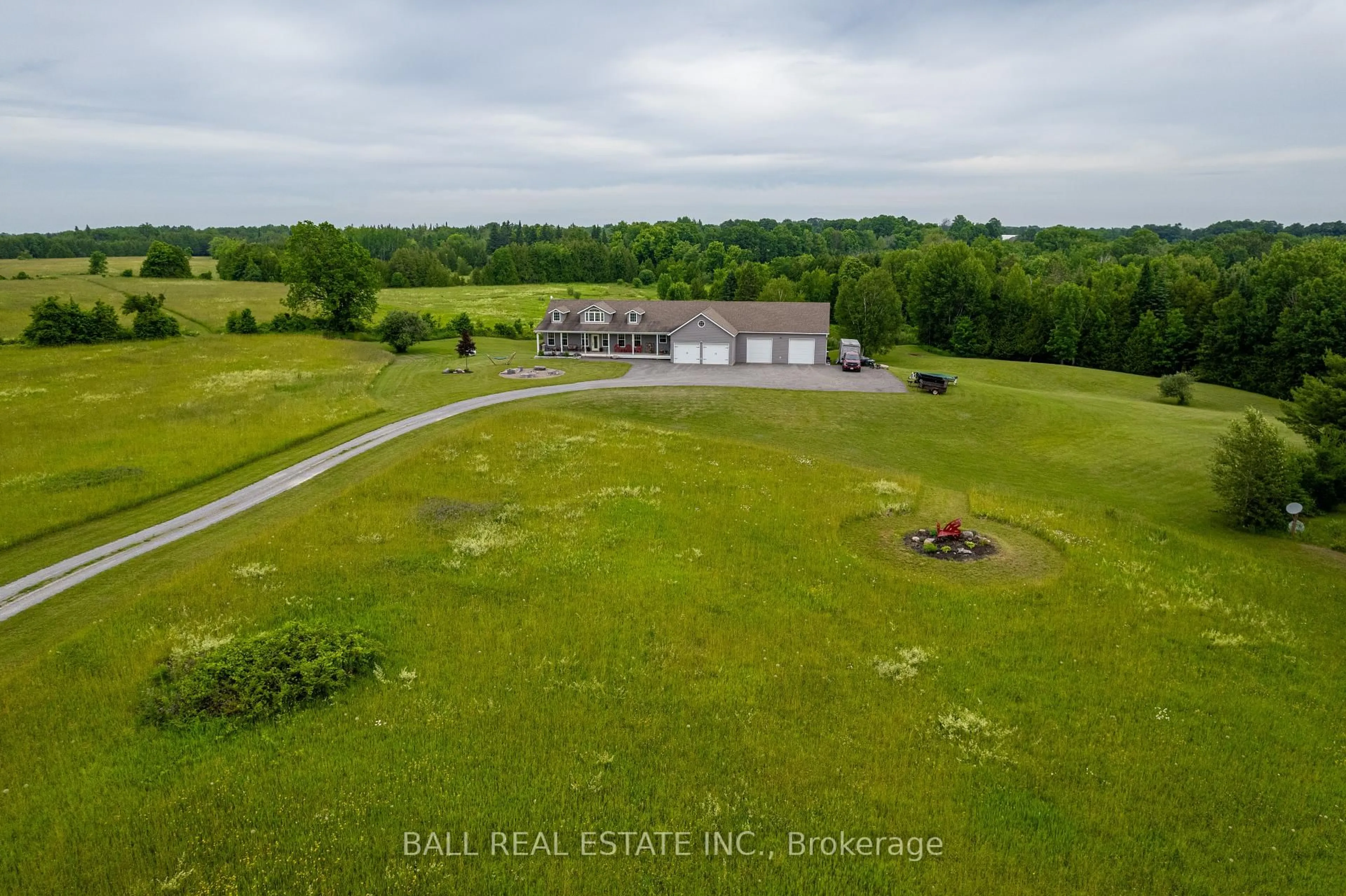 A pic from outside/outdoor area/front of a property/back of a property/a pic from drone, water/lake/river/ocean view for 2120 Deer Bay Rd, Selwyn Ontario K0L 2H0