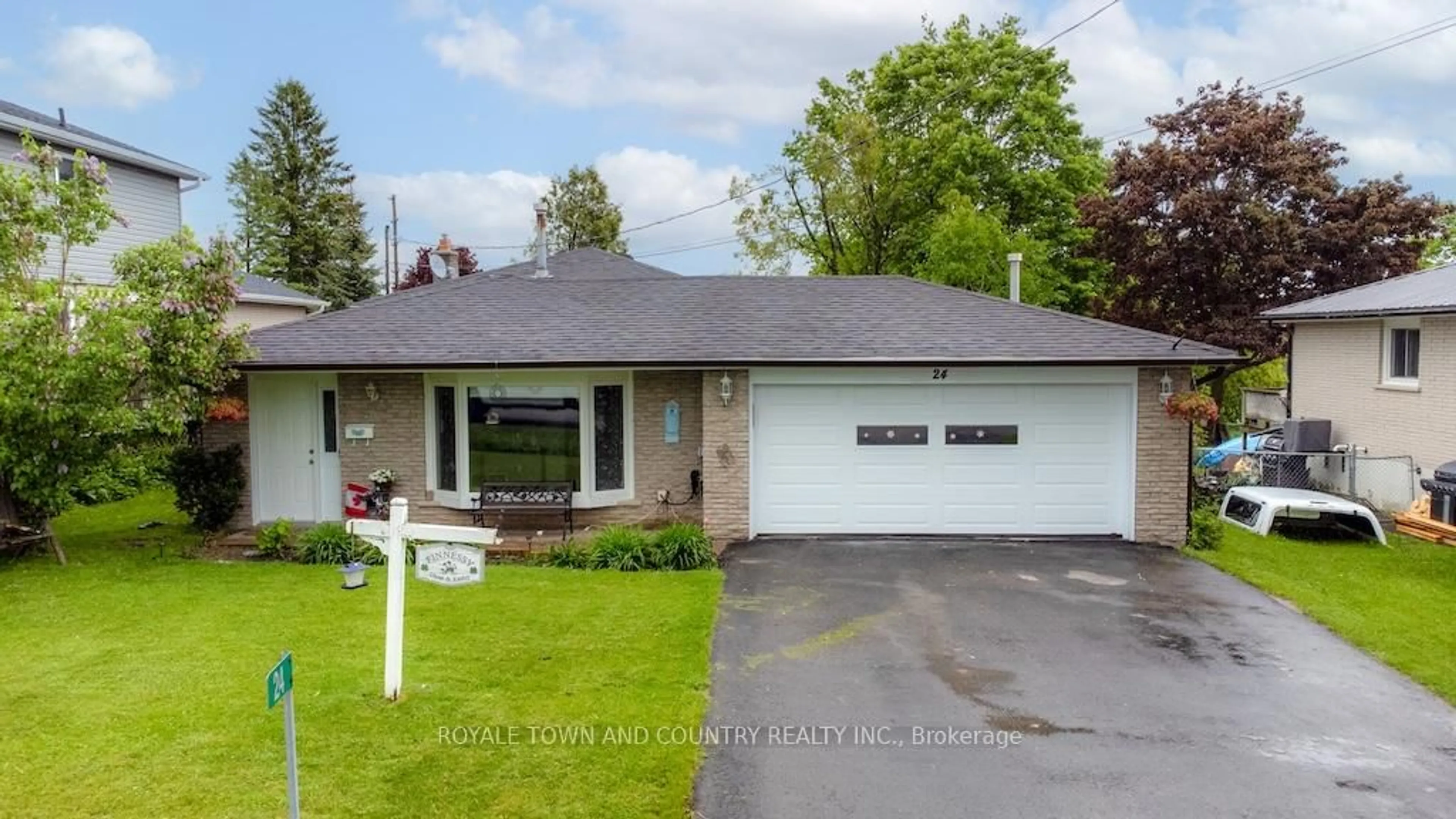 Home with vinyl exterior material, street for 24 Mohawk Dr, Kawartha Lakes Ontario K9V 0J6