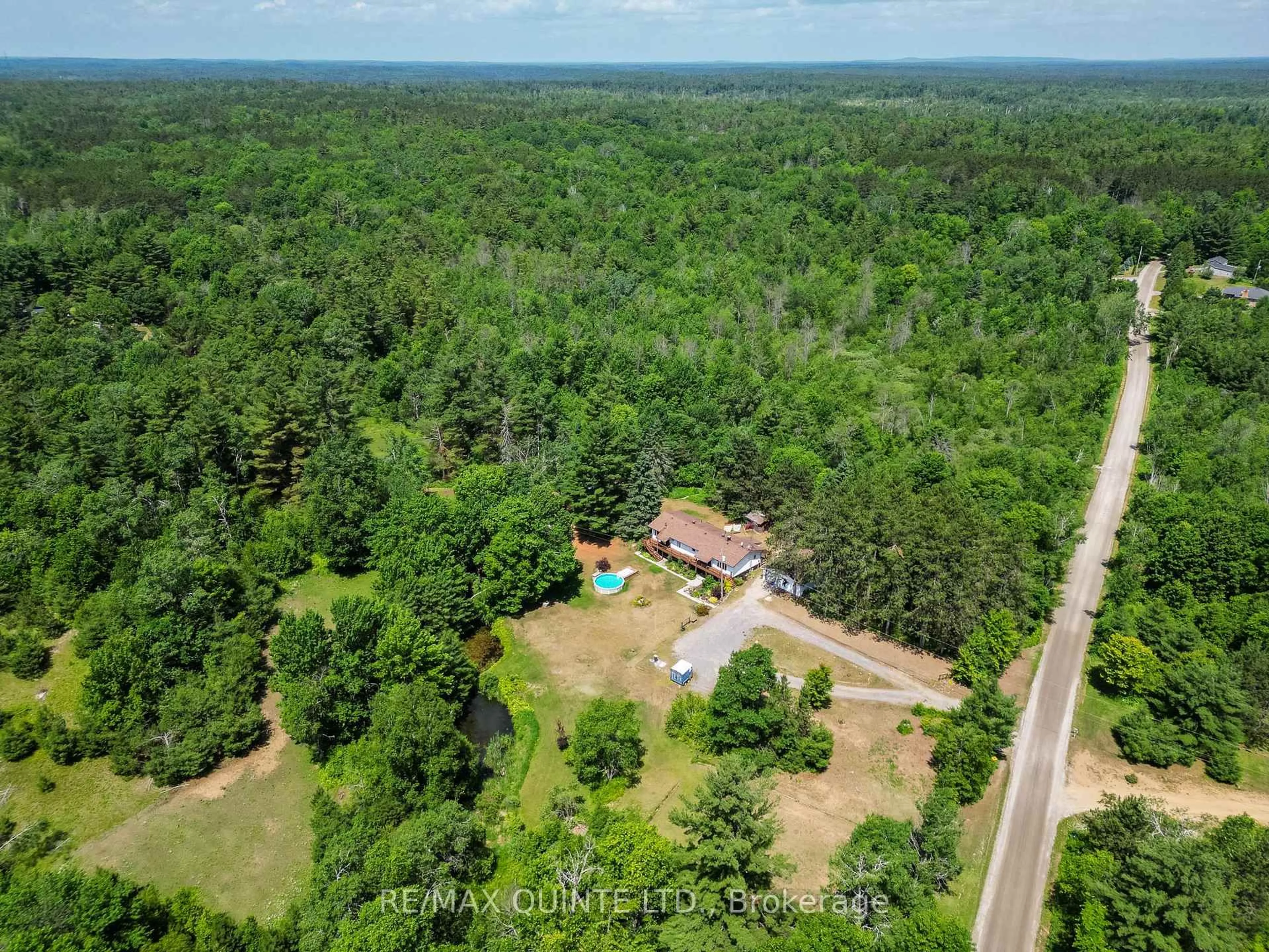 A pic from outside/outdoor area/front of a property/back of a property/a pic from drone, forest/trees view for 690 Potter Settlement Rd, Tweed Ontario K0K 3J0