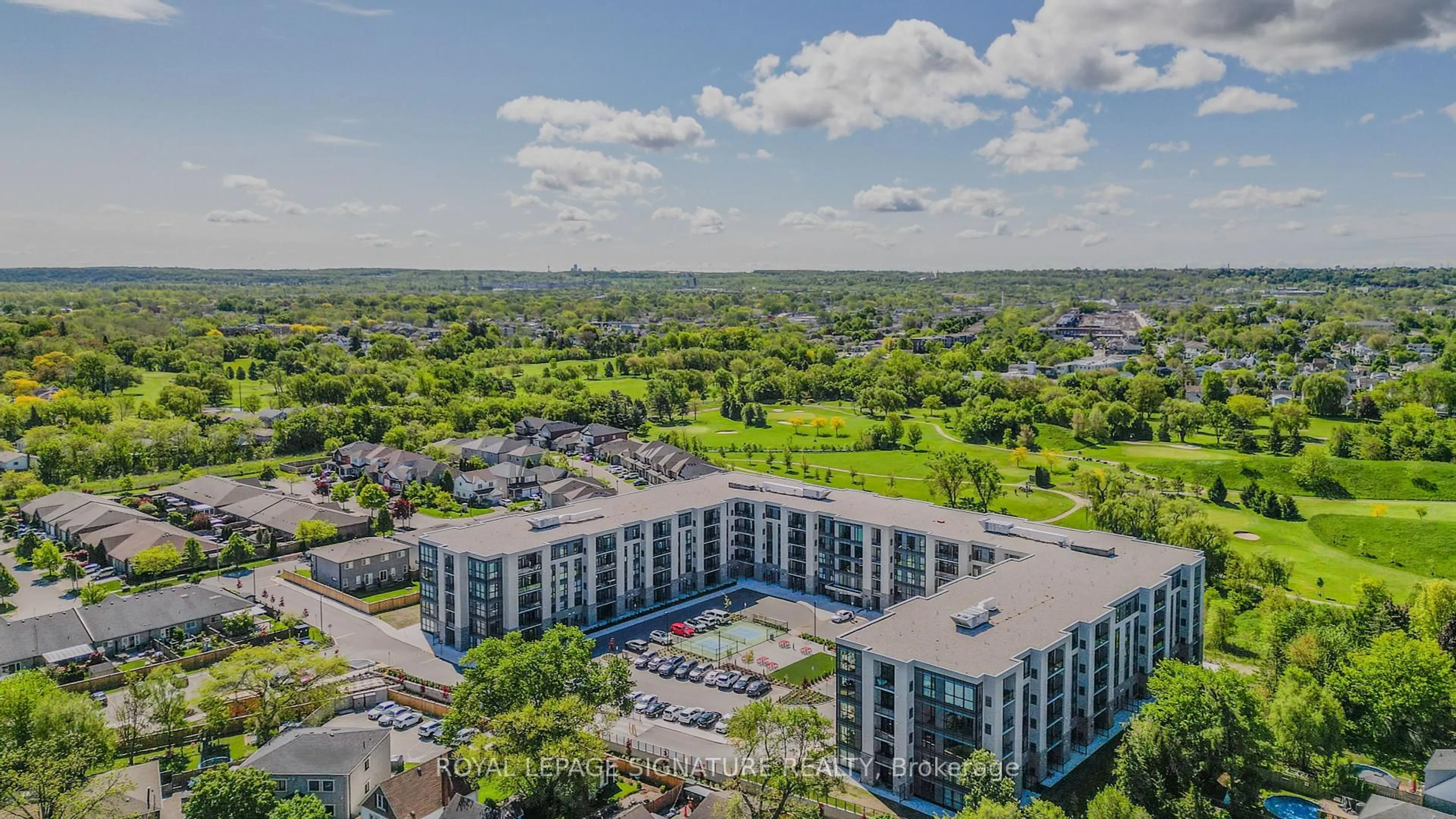 A pic from outside/outdoor area/front of a property/back of a property/a pic from drone, unknown for 50 Herrick Ave #130, St. Catharines Ontario L2P 0G3