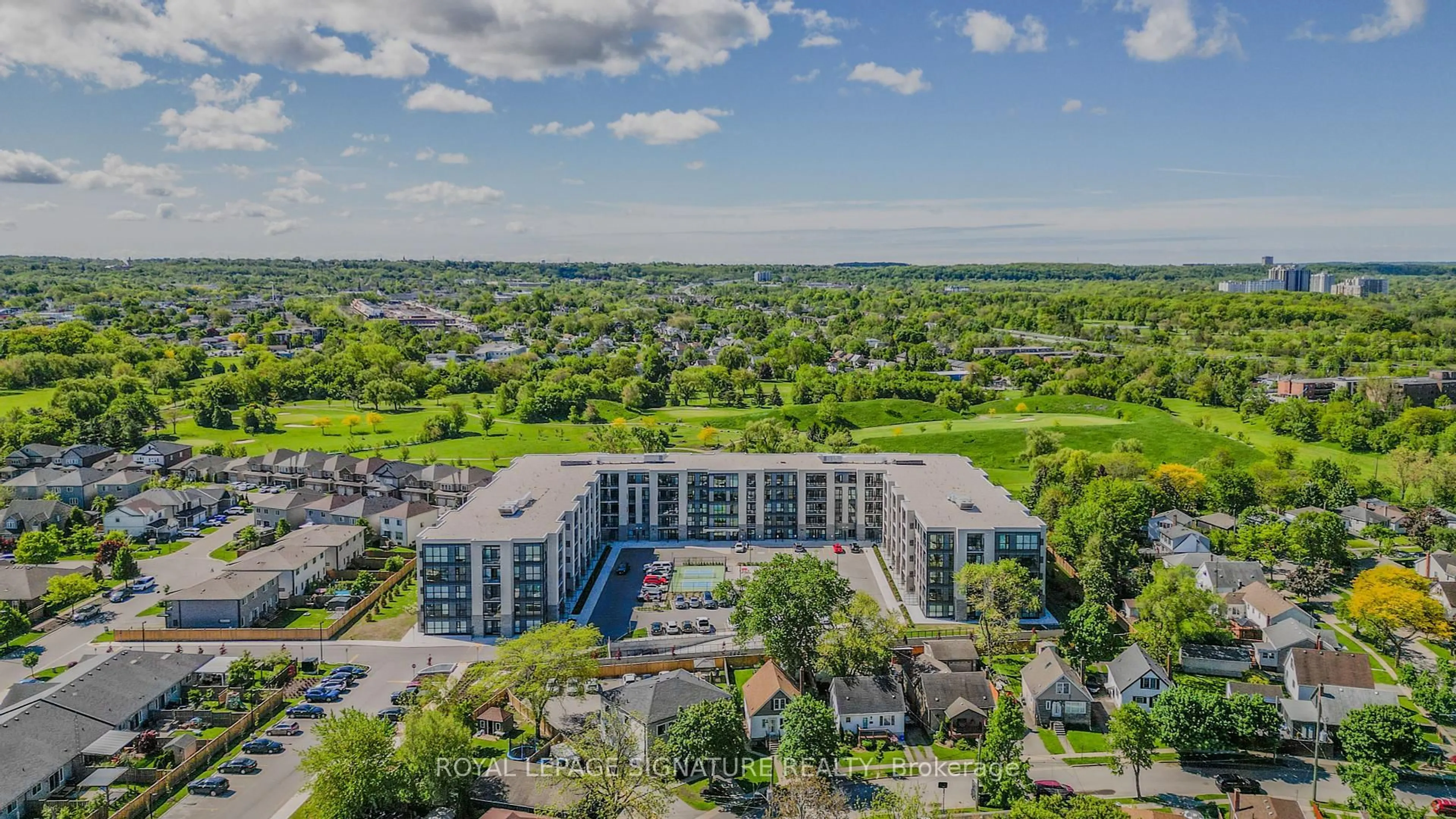 A pic from outside/outdoor area/front of a property/back of a property/a pic from drone, water/lake/river/ocean view for 50 Herrick Ave #130, St. Catharines Ontario L2P 0G3