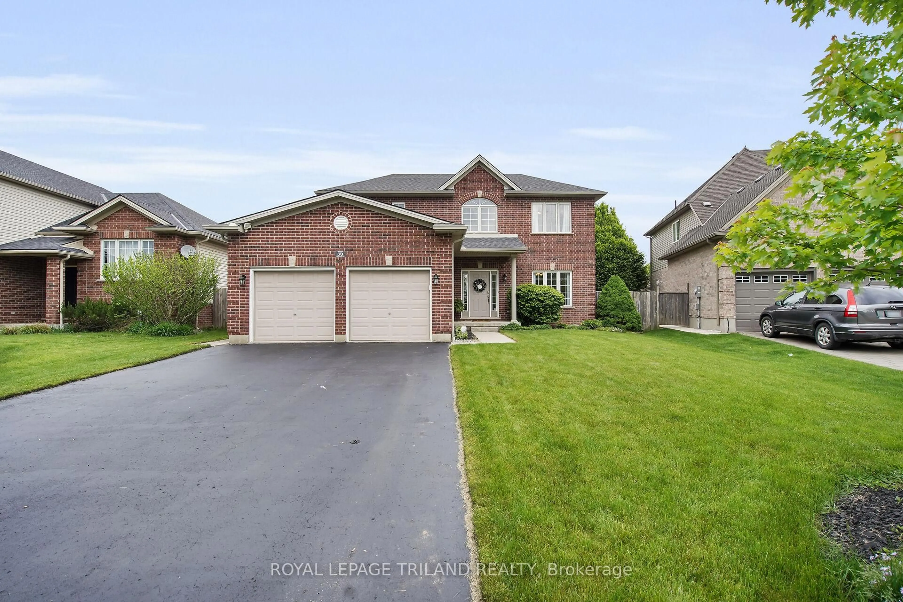 Home with brick exterior material, street for 30 Willard Cres, Middlesex Centre Ontario N0L 1R0