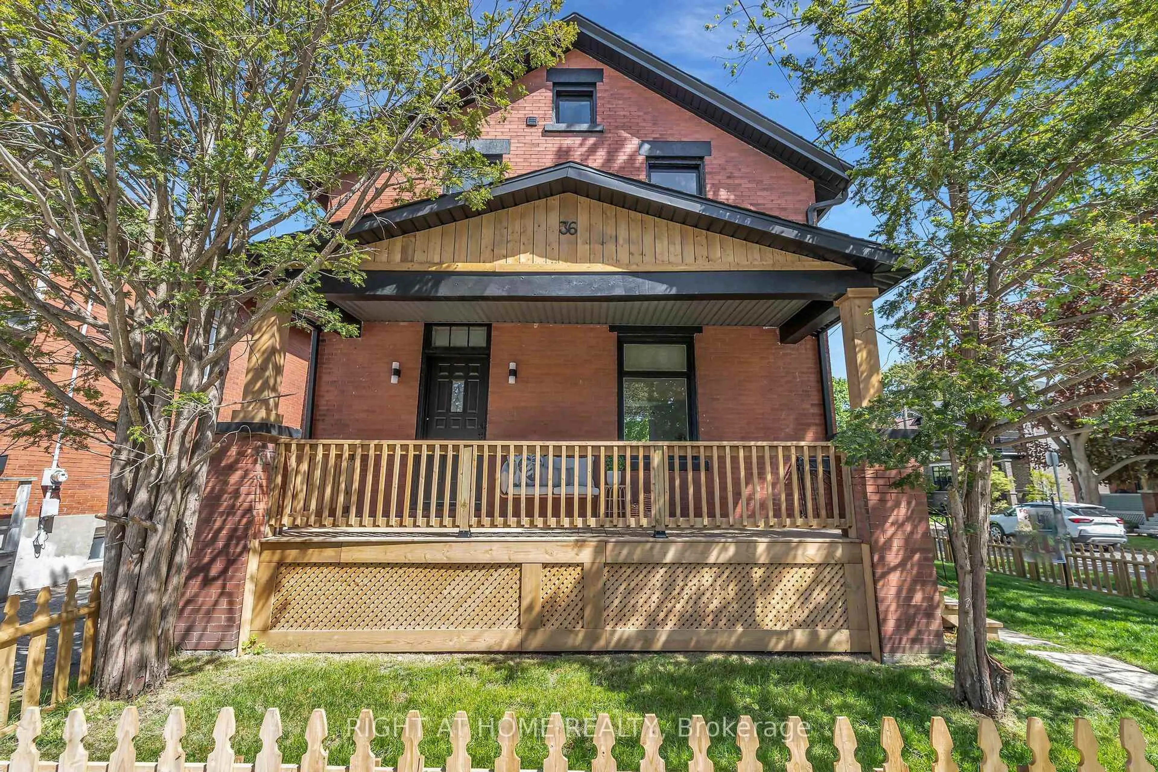 Home with brick exterior material, street for 36 Surrey St, Guelph Ontario N1H 3R4